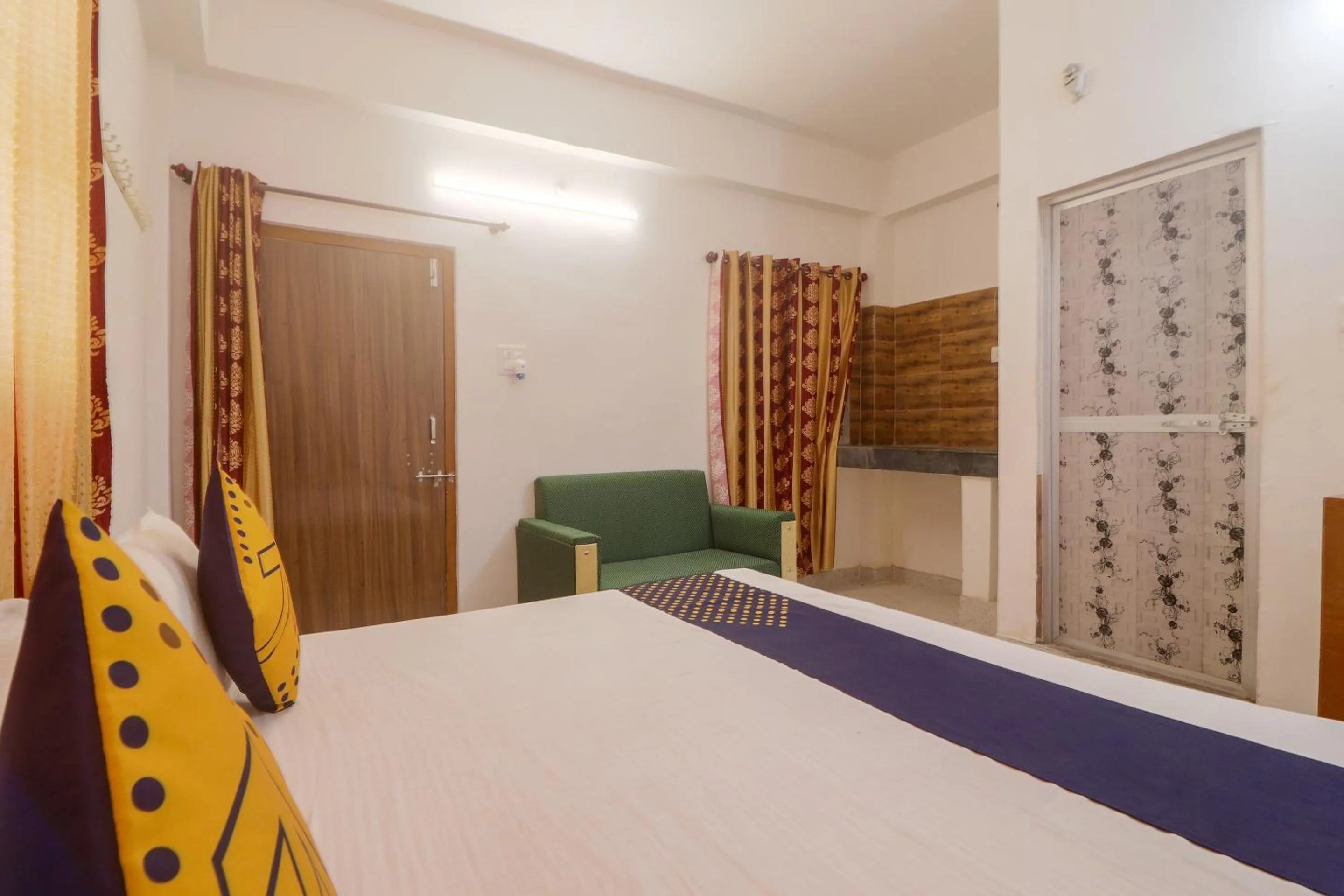Bedroom in SPOT ON Hotel Om Kanha