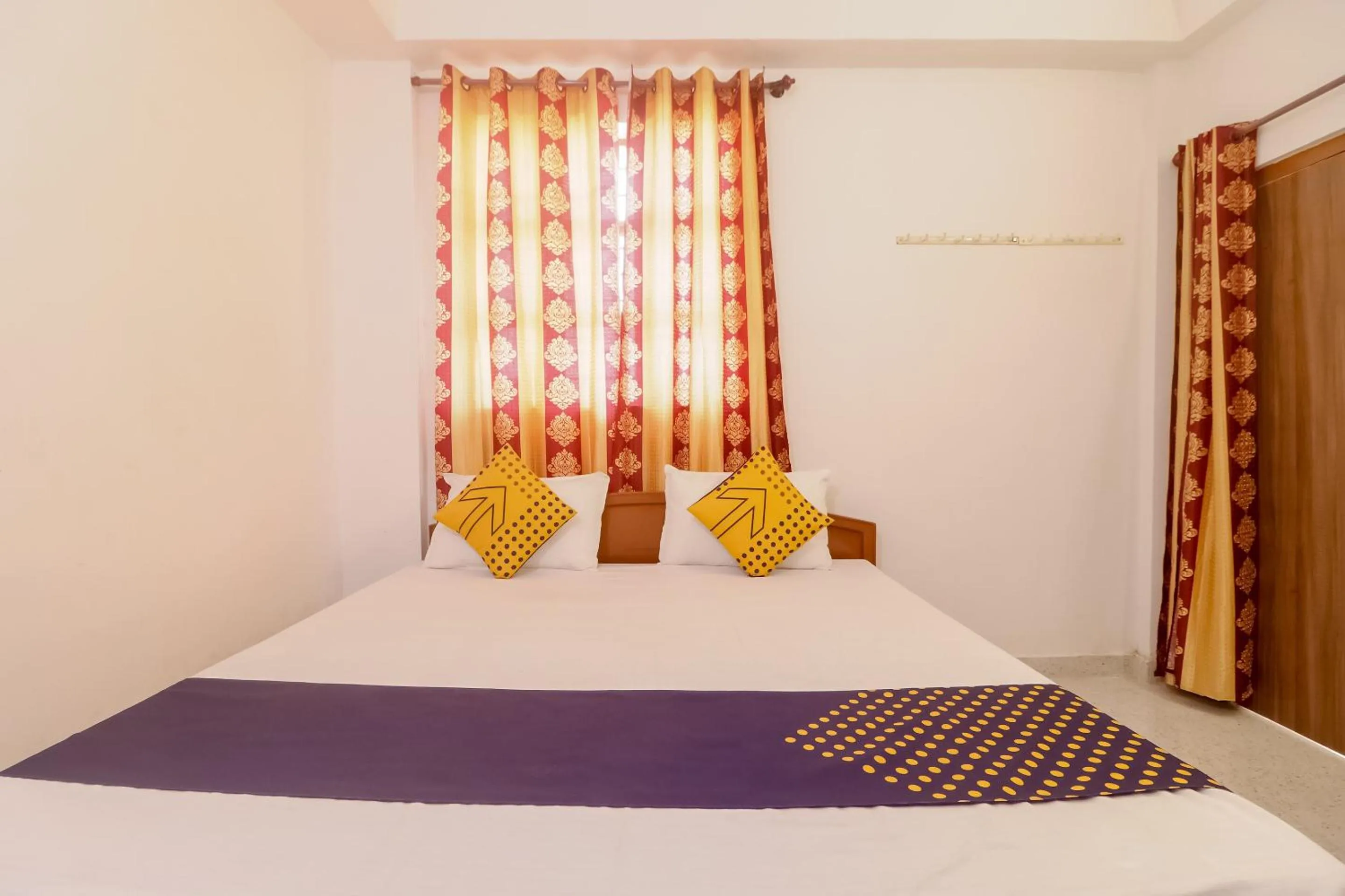 Bedroom in SPOT ON Hotel Om Kanha