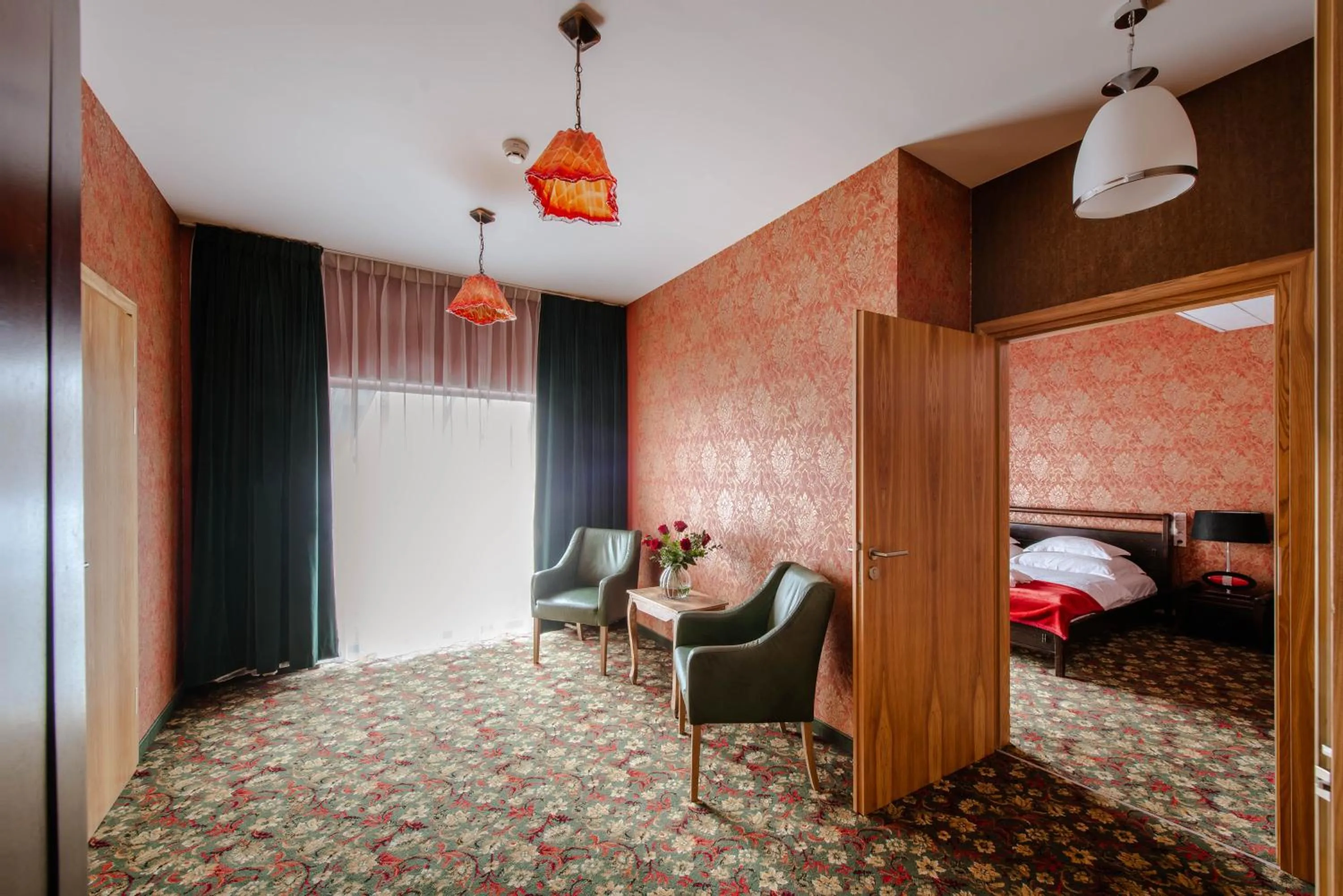 Seating area, Bed in Hotel Lenart
