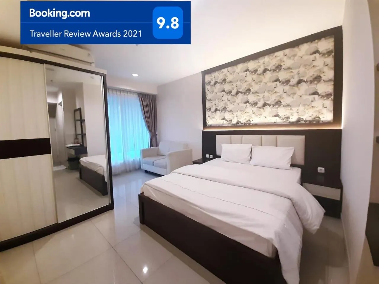 Bed in Apartemen Grand Kamala Lagoon Studio By Bonzela Property