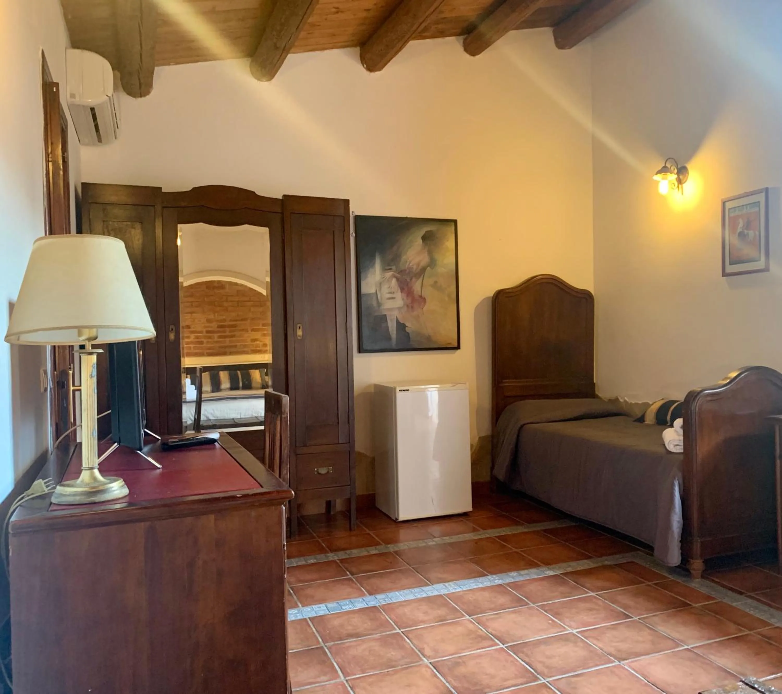 Bed in Aranceto Hotel