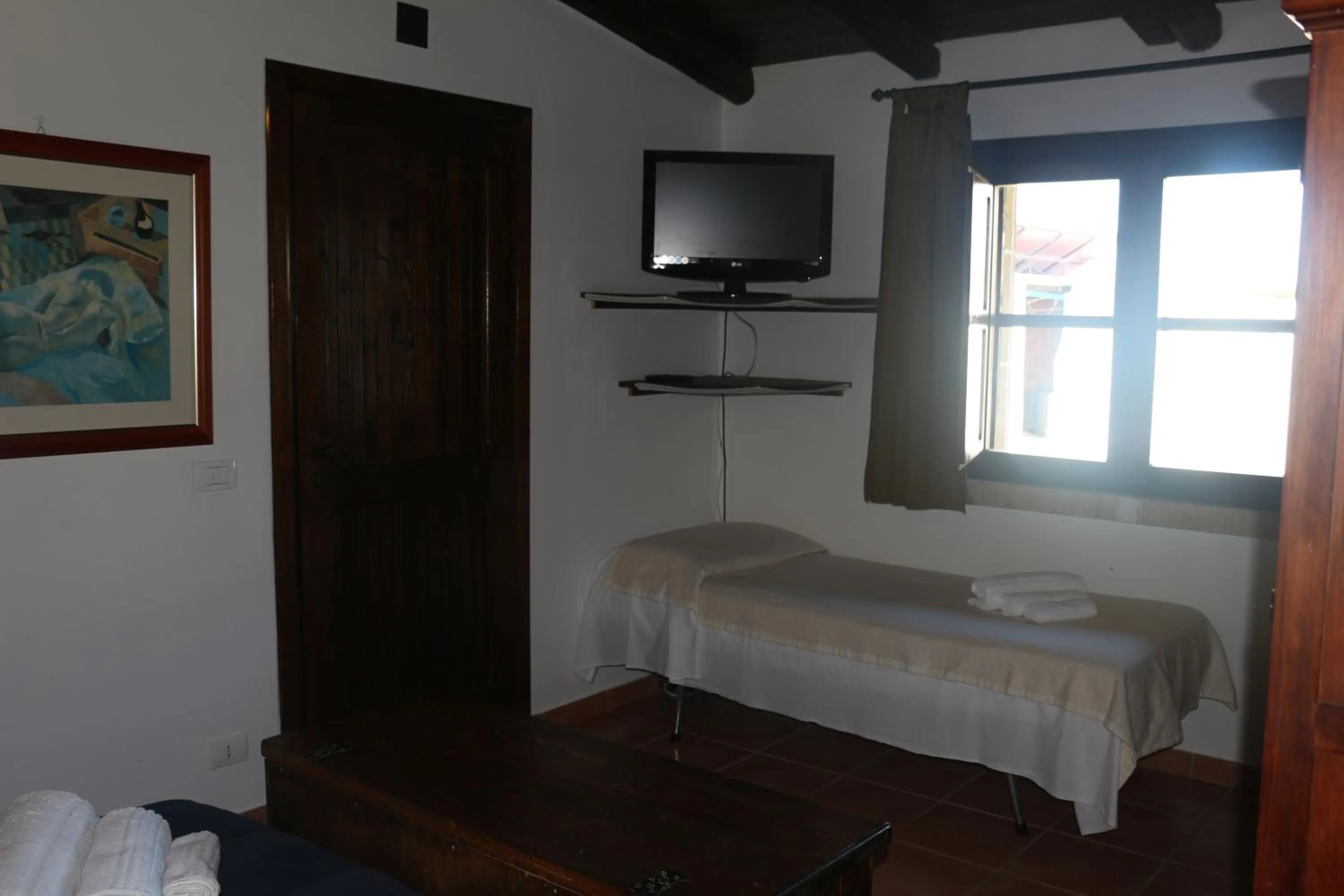 Bed in Aranceto Hotel