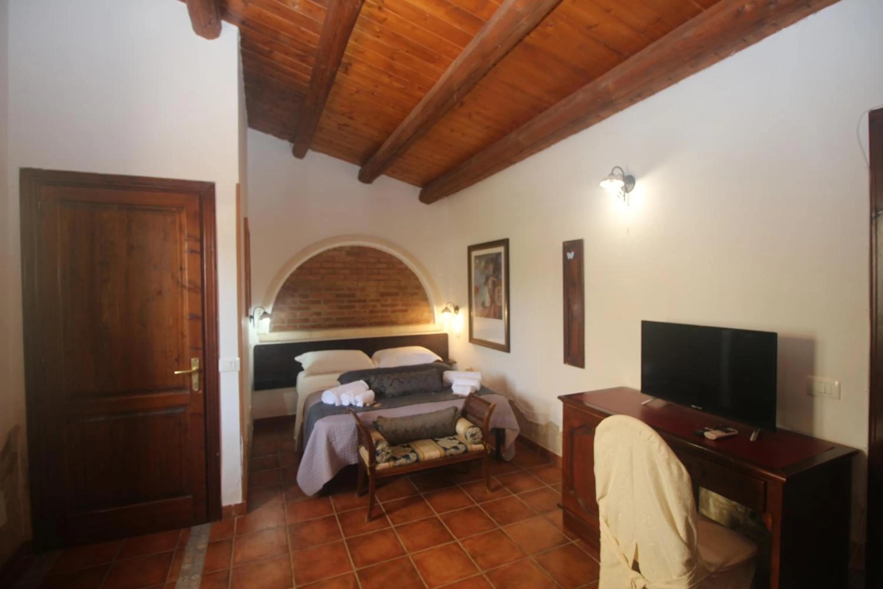 Bed in Aranceto Hotel