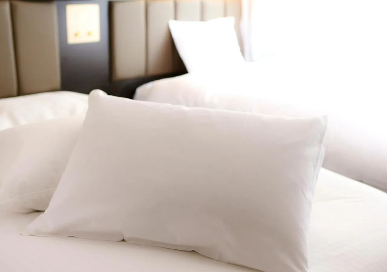 Bed in APA Hotel Hakata Higashihieekimae