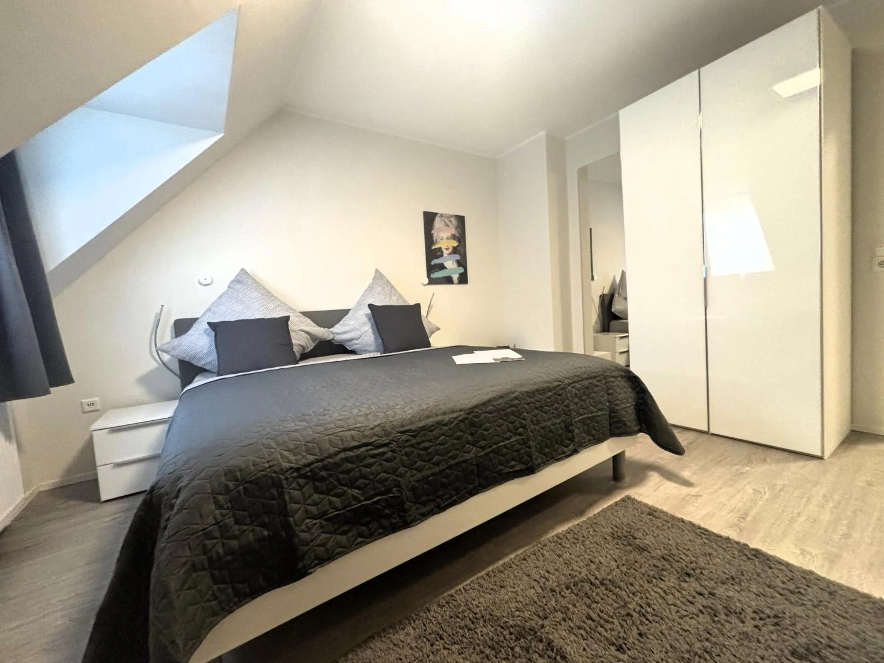 Photo of the whole room in Simplex Stays Hotel Quartier 8 - Digital Access