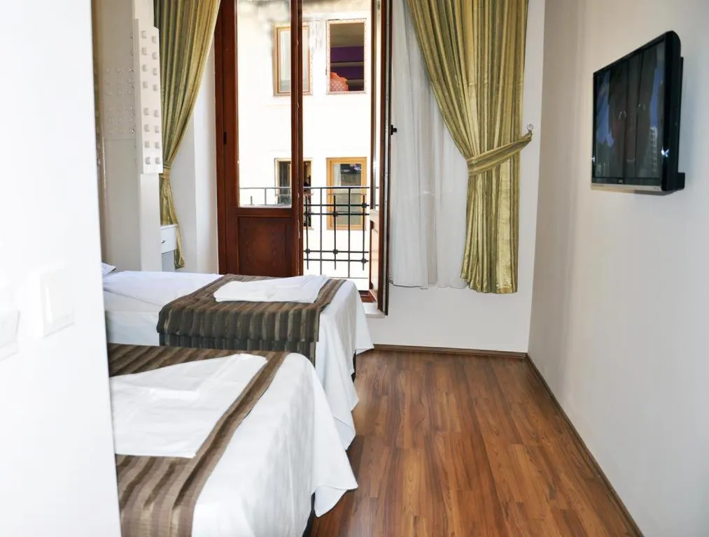 Bed in Gh Suites Taxim Hotel