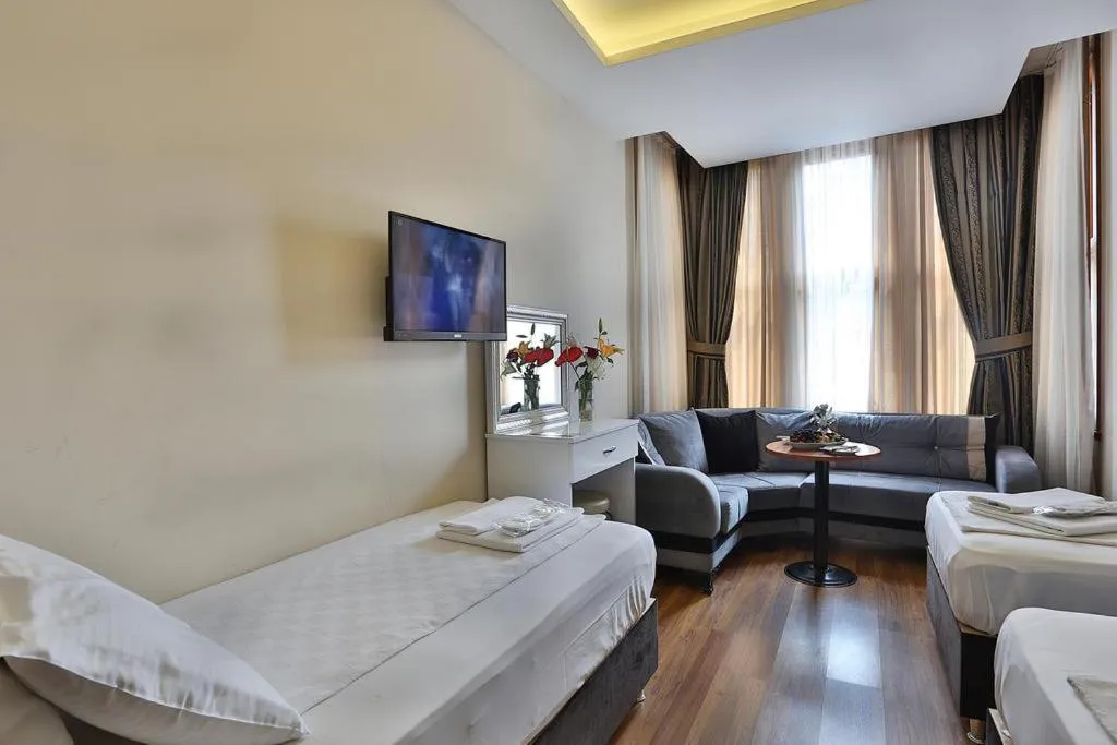 Bed in Gh Suites Taxim Hotel