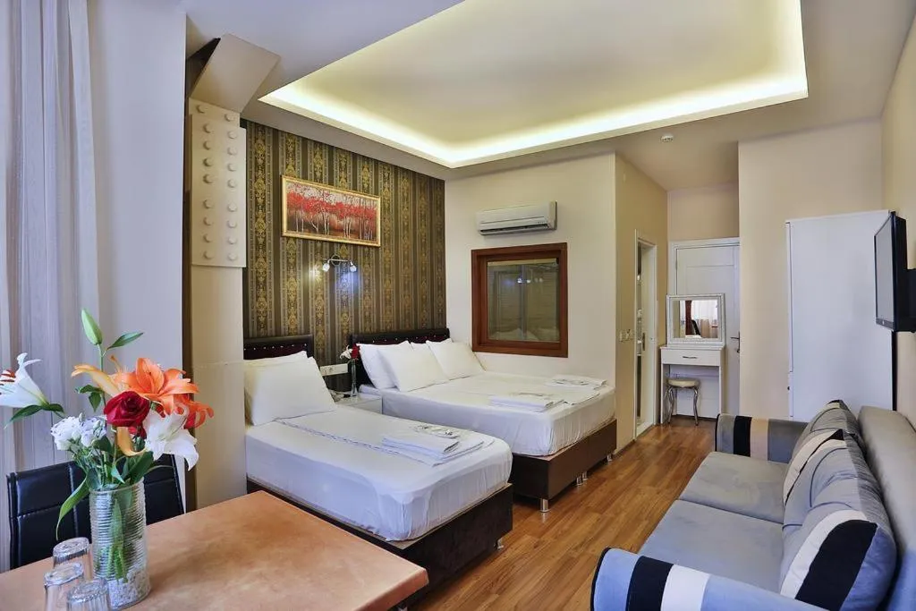 Bed in Gh Suites Taxim Hotel