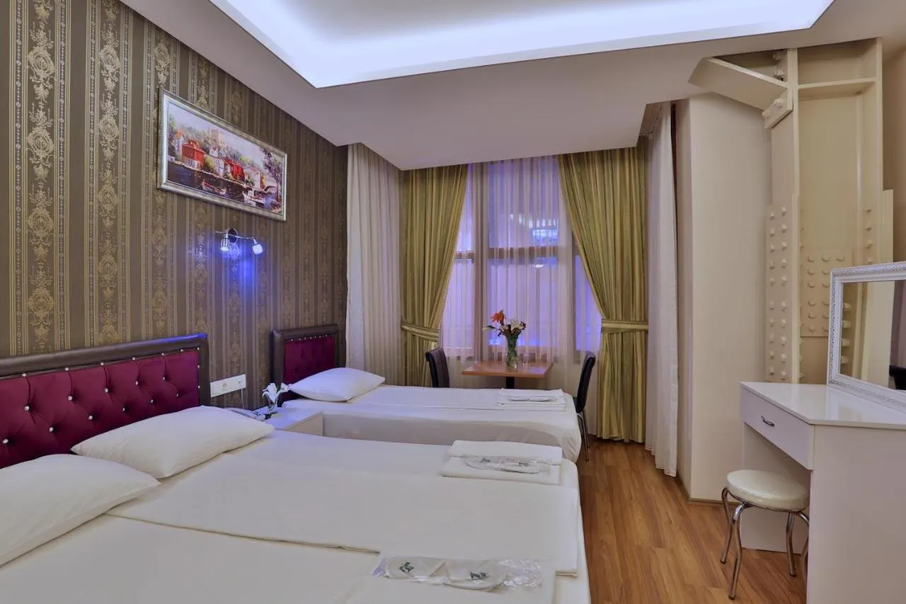 Bed in Gh Suites Taxim Hotel