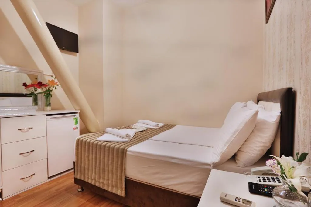 Bed in Gh Suites Taxim Hotel