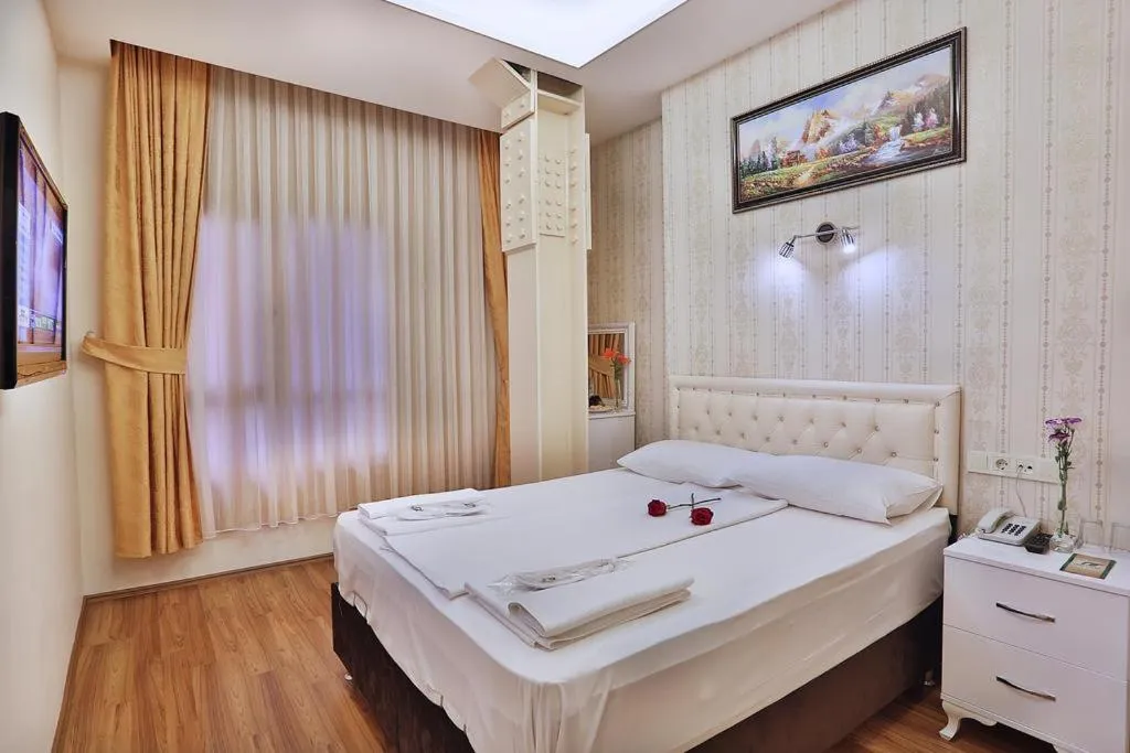 Bed in Gh Suites Taxim Hotel