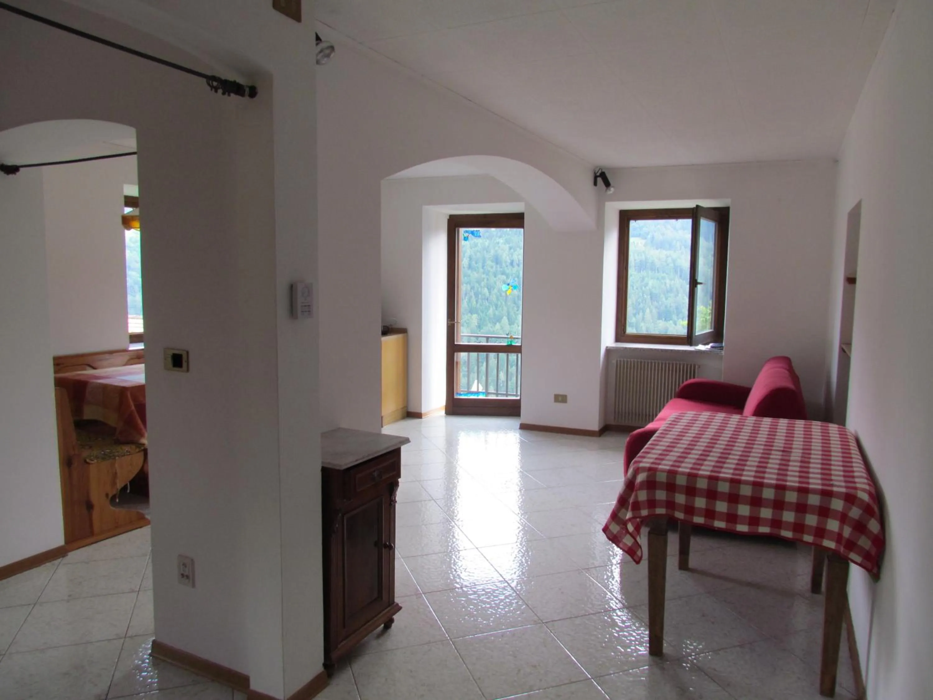 Living room, Bed in Appartamenti Rumo