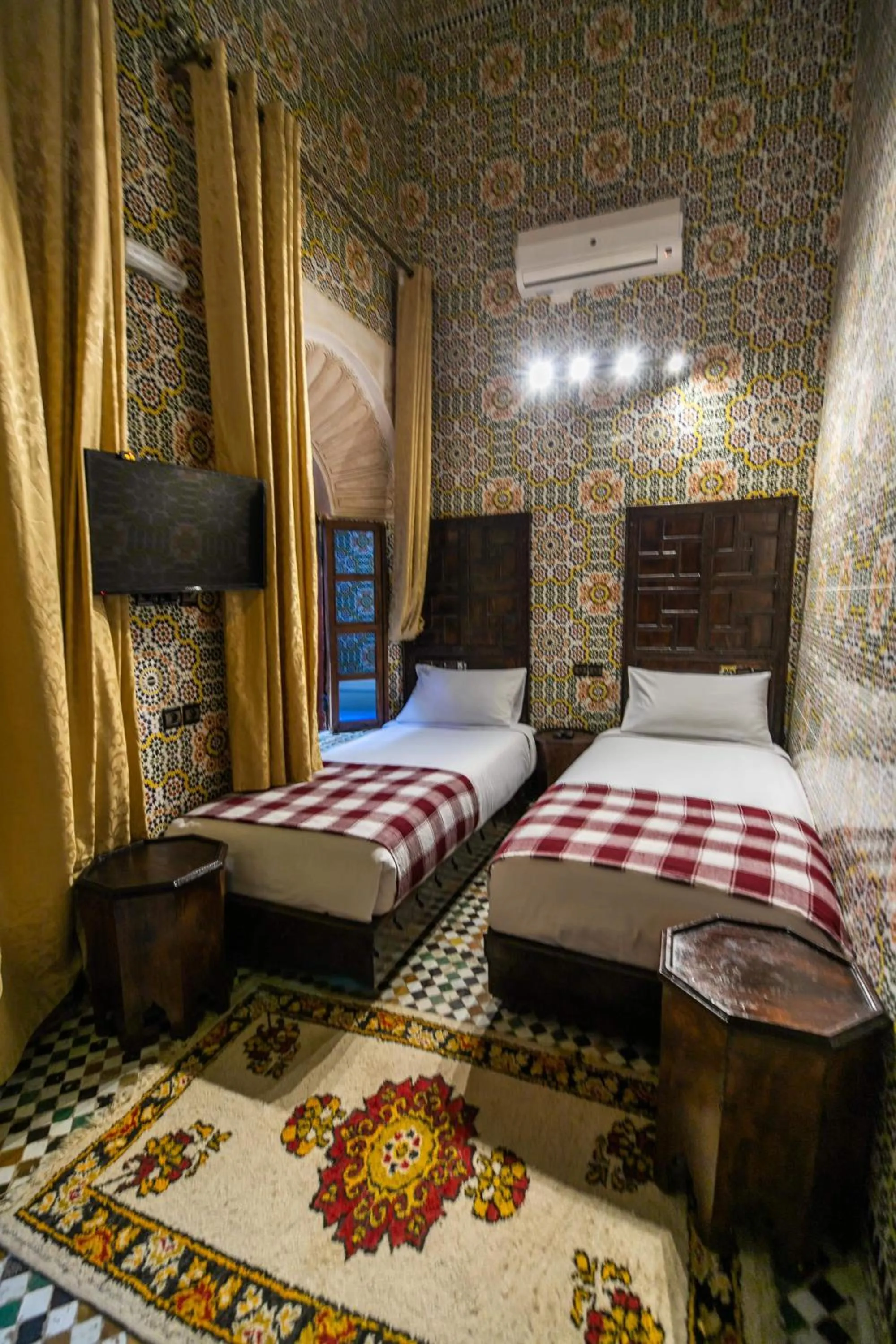 Bed in Riad Fes Aicha & SPA