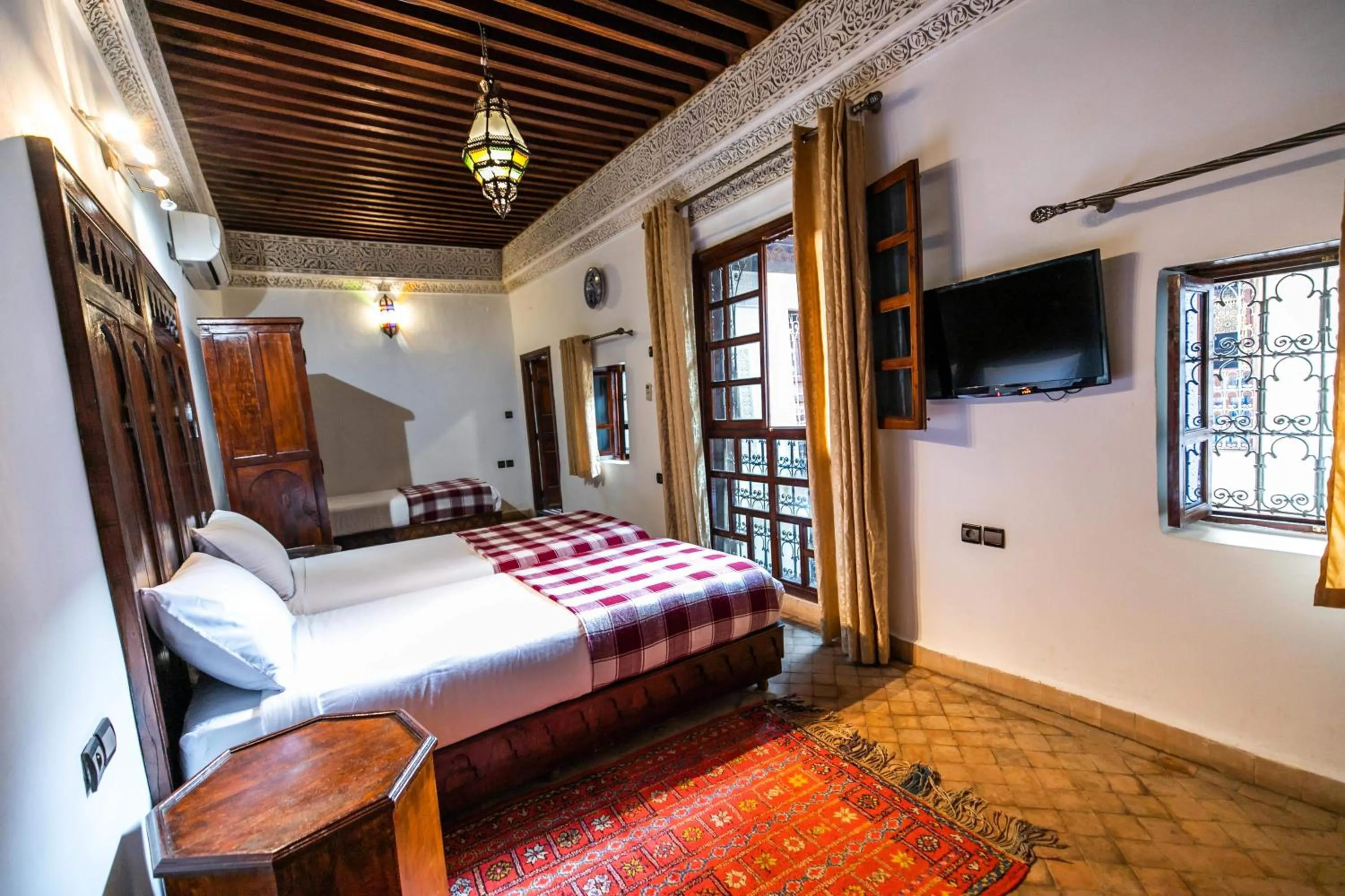 Bed in Riad Fes Aicha & SPA