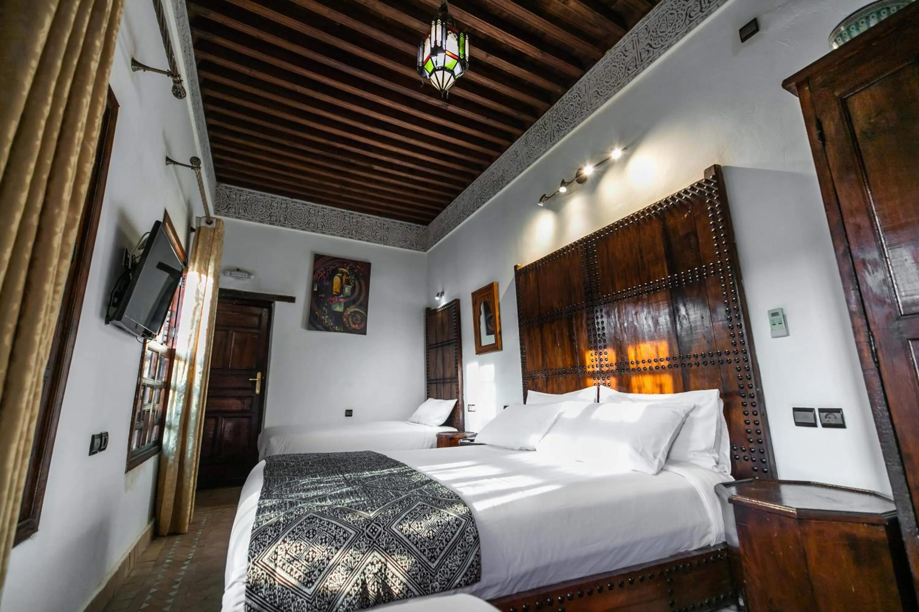 Bed in Riad Fes Aicha & SPA