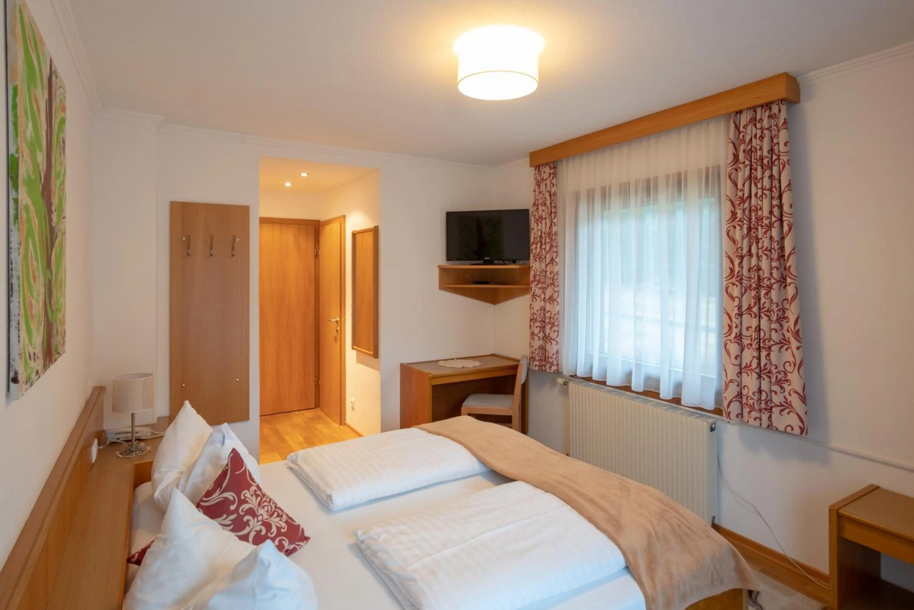 Photo of the whole room, Bed in Alpenhotel Badmeister