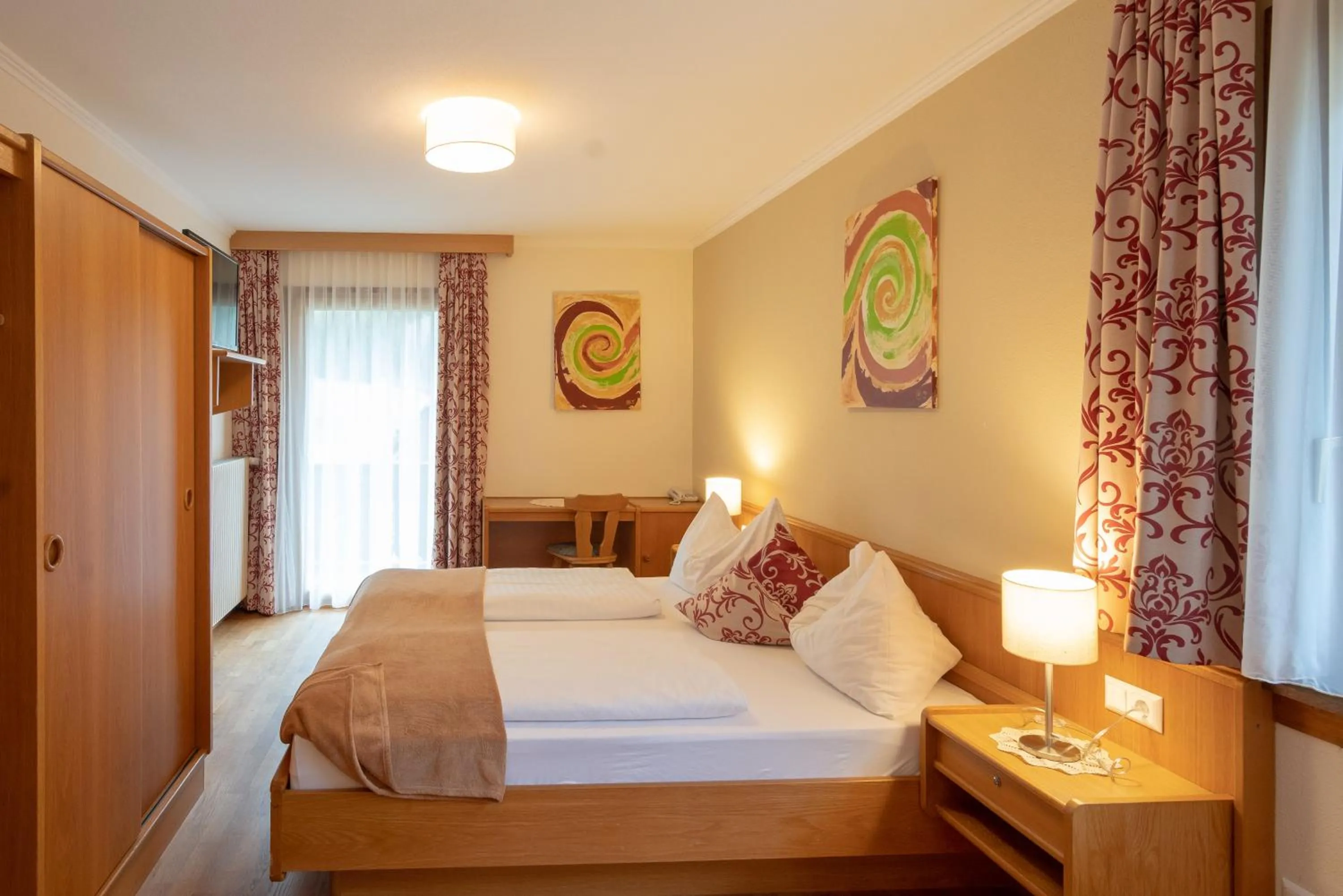Photo of the whole room, Bed in Alpenhotel Badmeister