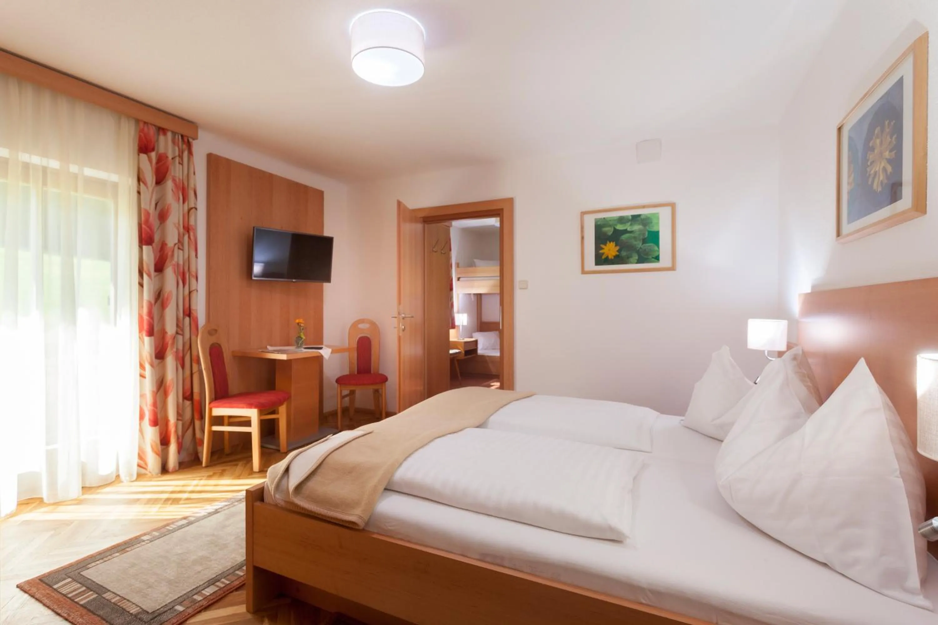 Photo of the whole room, Bed in Alpenhotel Badmeister