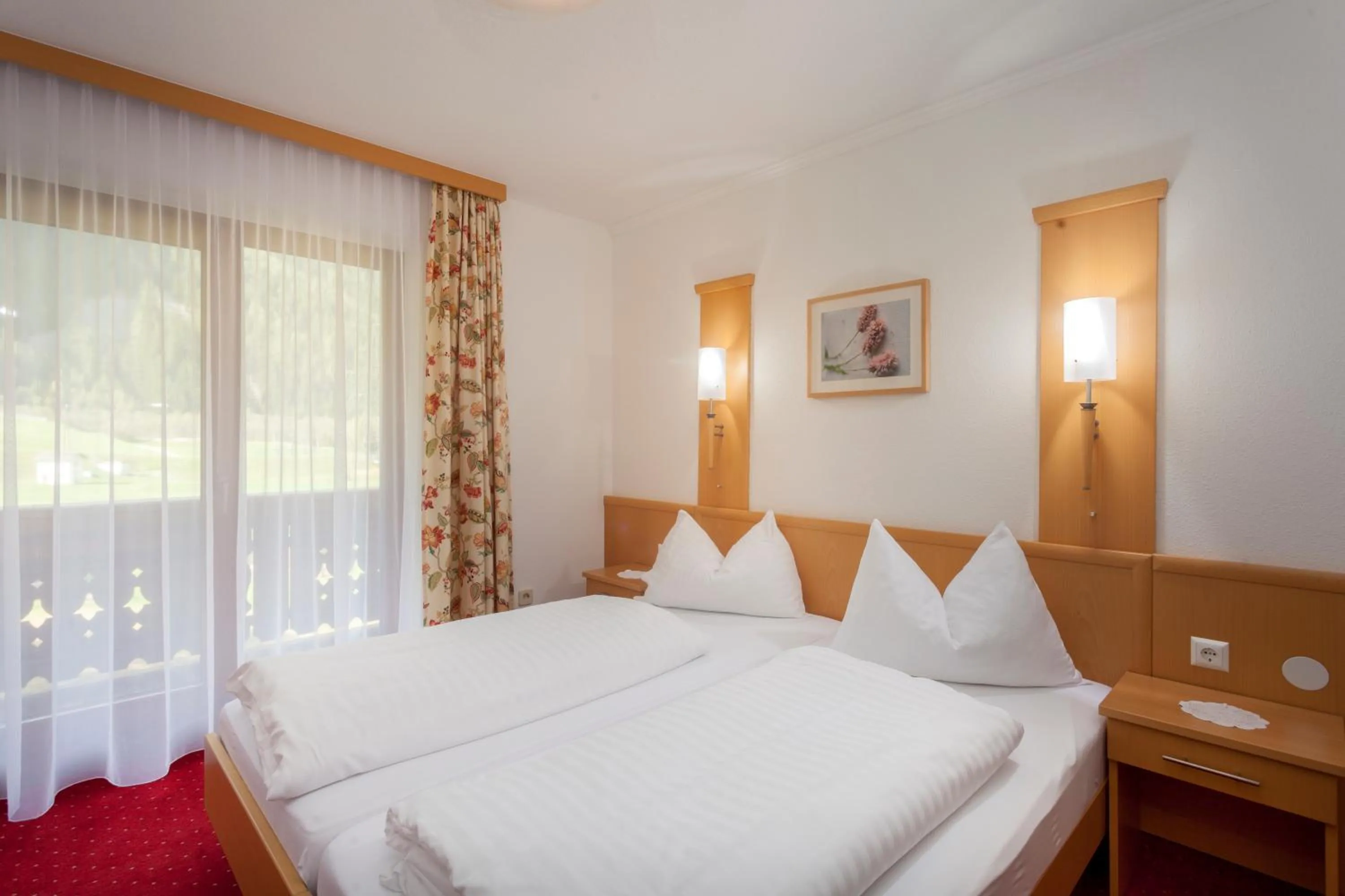 Photo of the whole room, Bed in Alpenhotel Badmeister