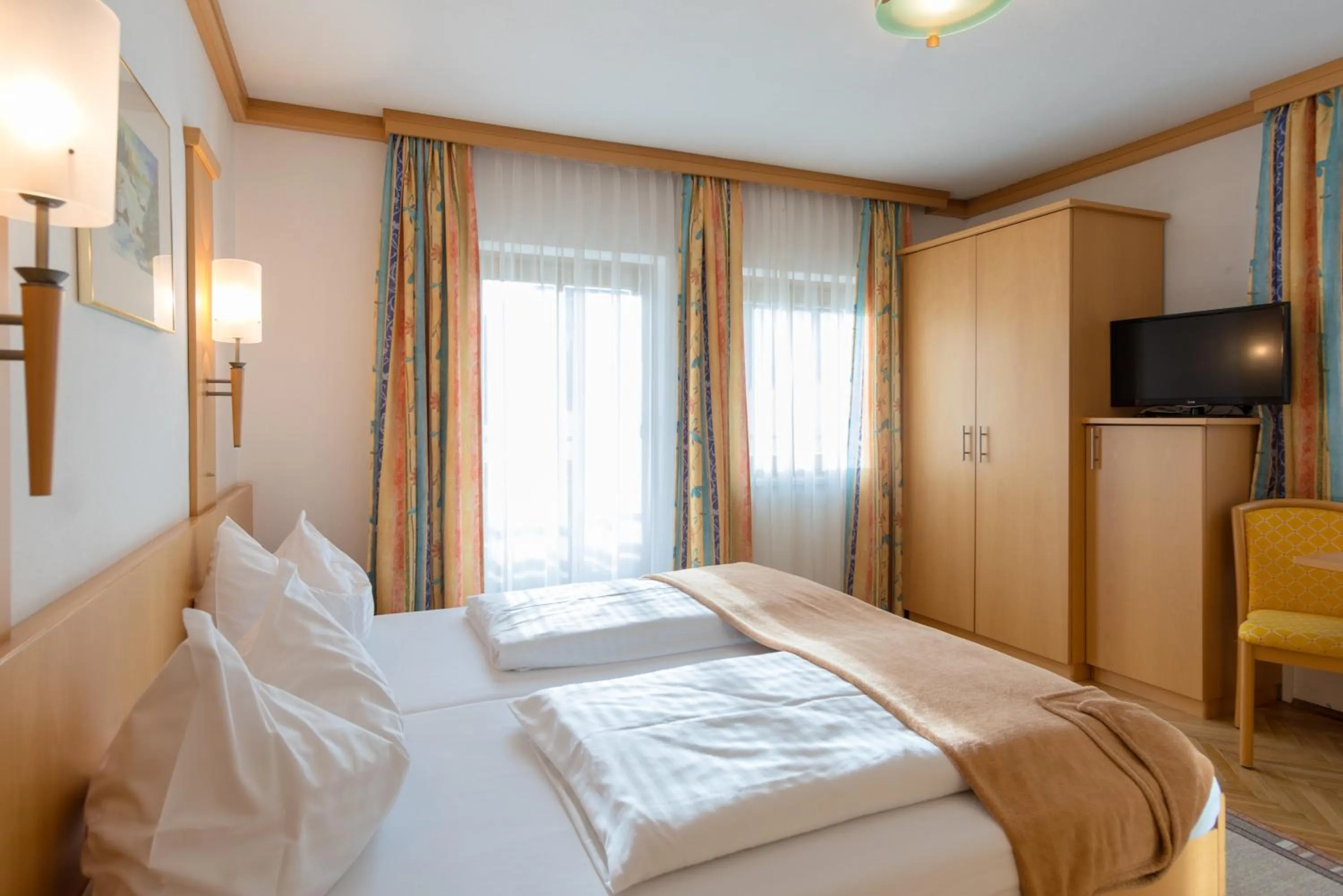 Photo of the whole room, Bed in Alpenhotel Badmeister
