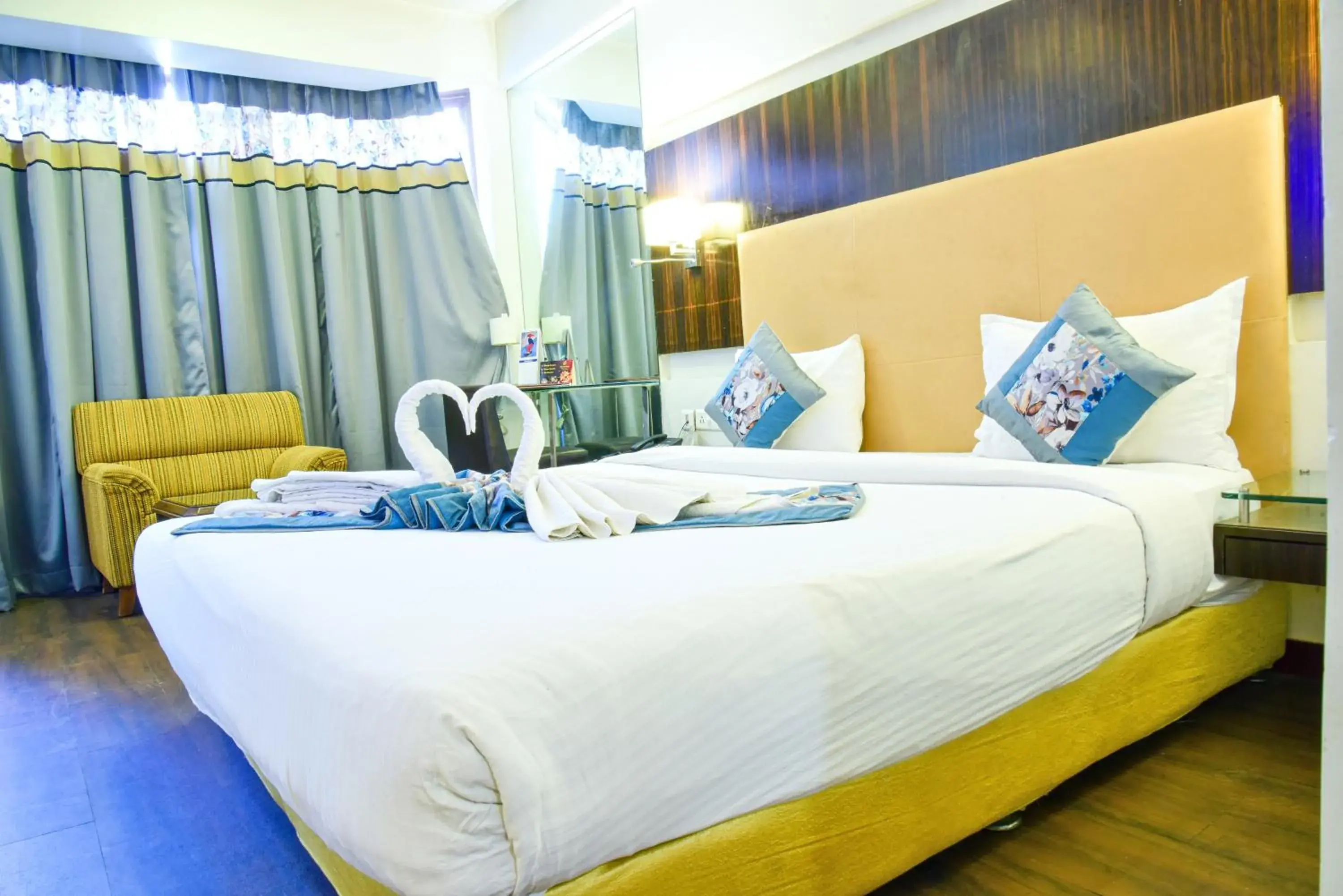 Bed in Quality Inn Residency Bed in Quality Inn Residency