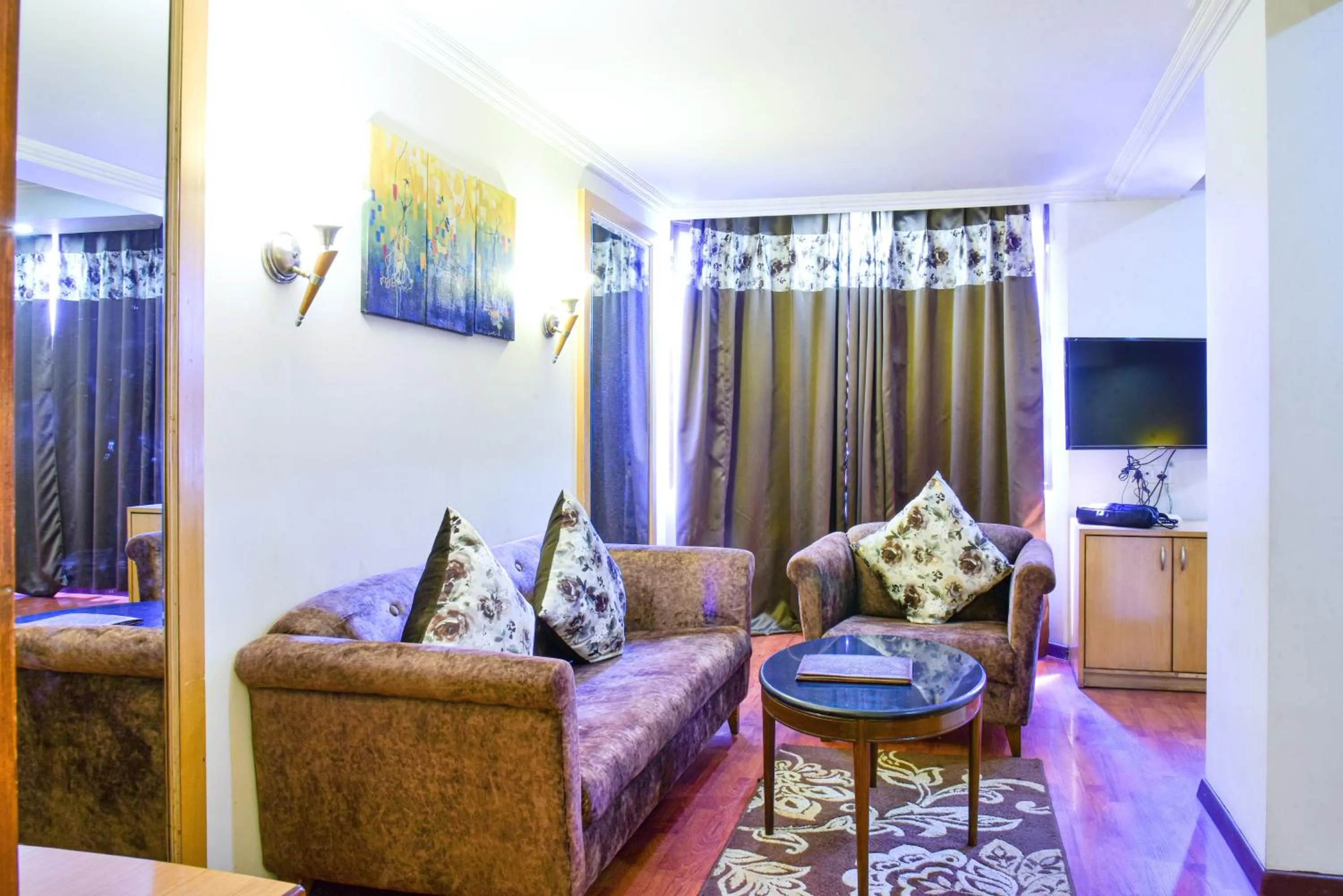 Living room in Quality Inn Residency