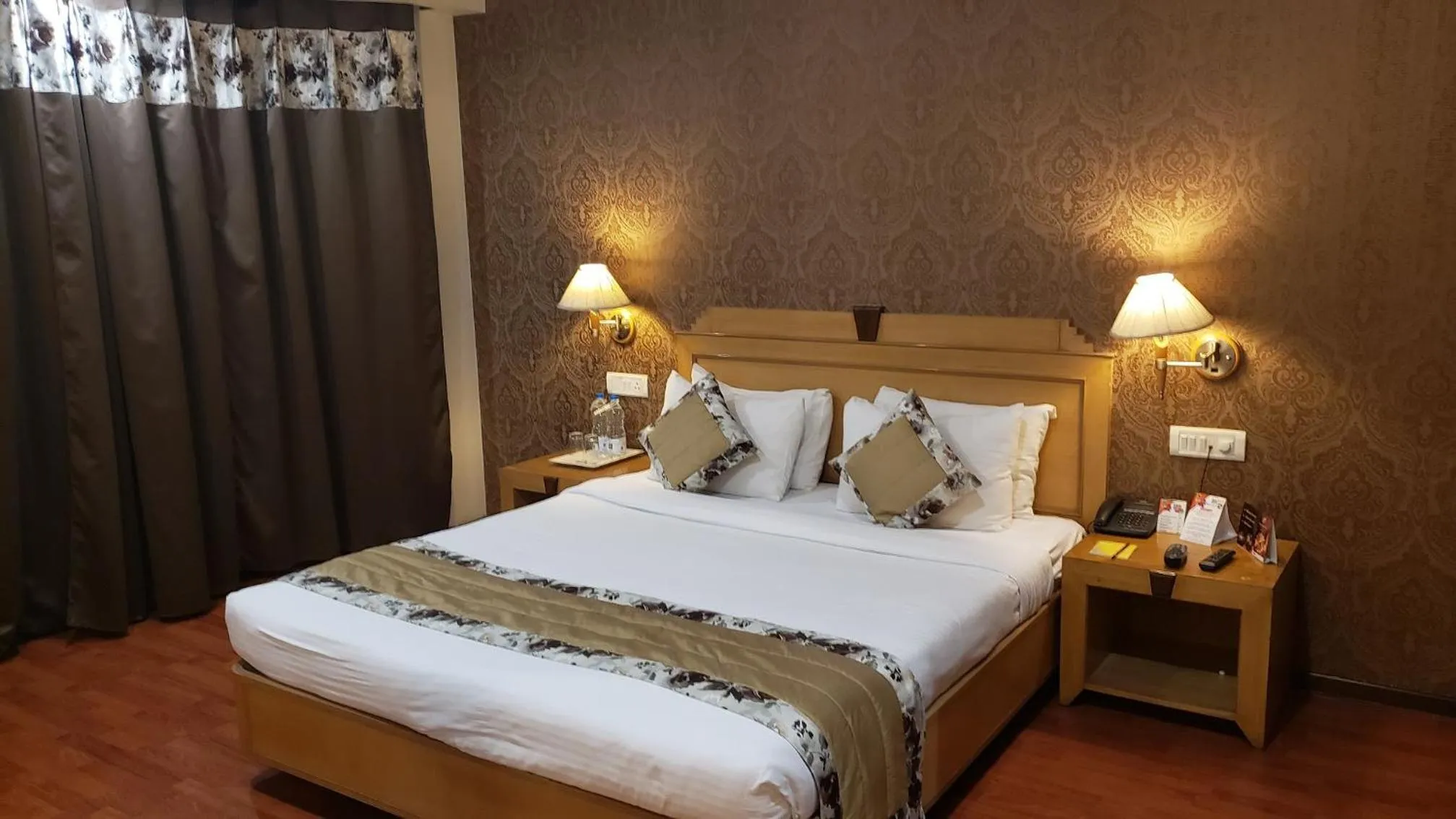 Bed in Quality Inn Residency