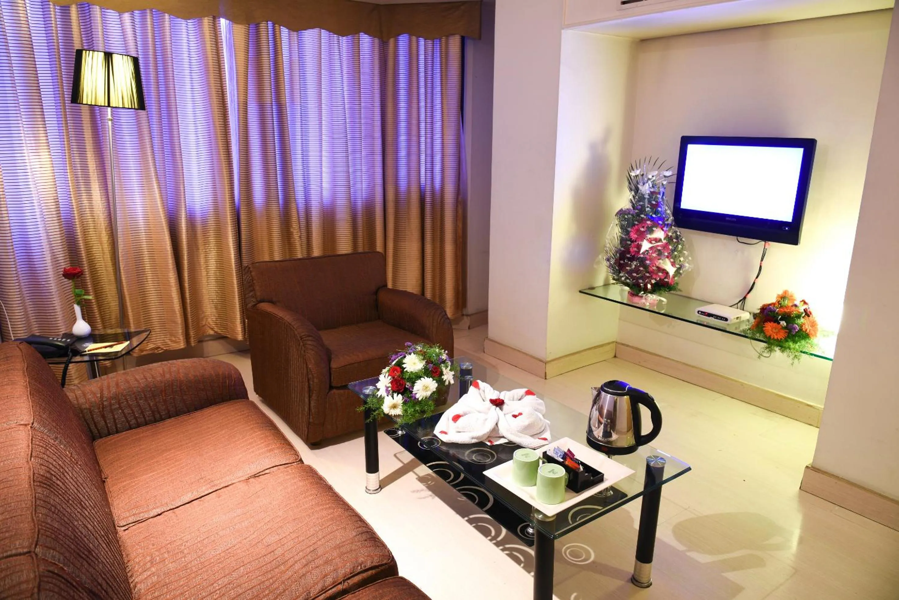 Living room in Quality Inn Residency