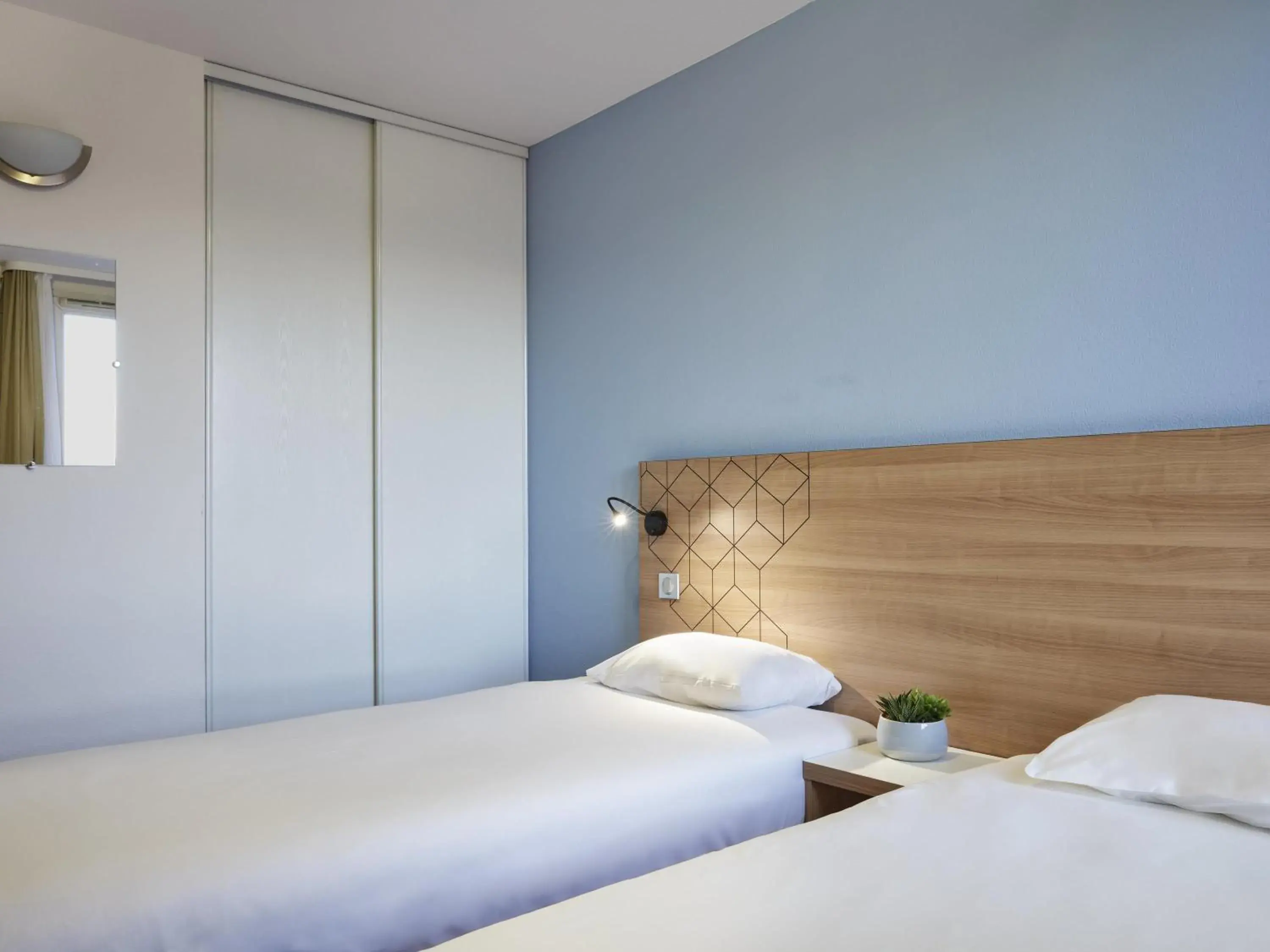 Bedroom, Bed in Aparthotel Adagio Access Paris Quai d'Ivry Bedroom, Bed in Aparthotel Adagio Access Paris Quai d'Ivry