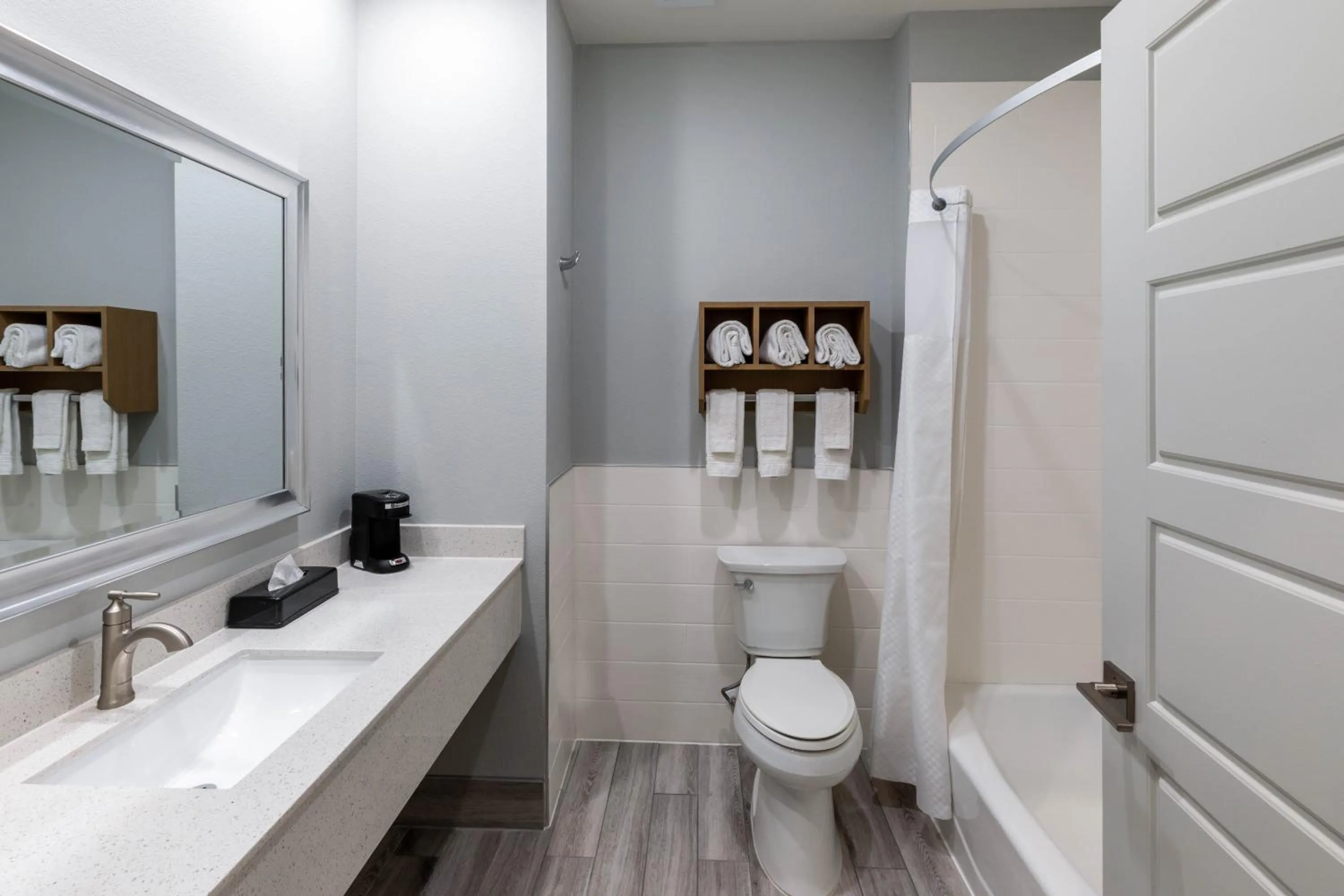 Bathroom in Days Inn & Suites by Wyndham Downtown/University of Houston