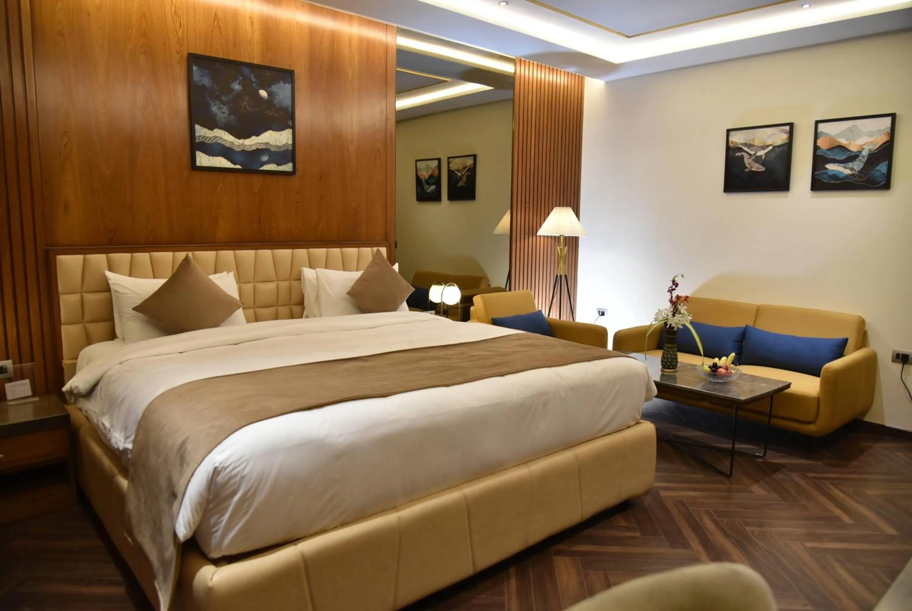 Photo of the whole room, Bed in Ramada Encore by Wyndham Statue of Unity