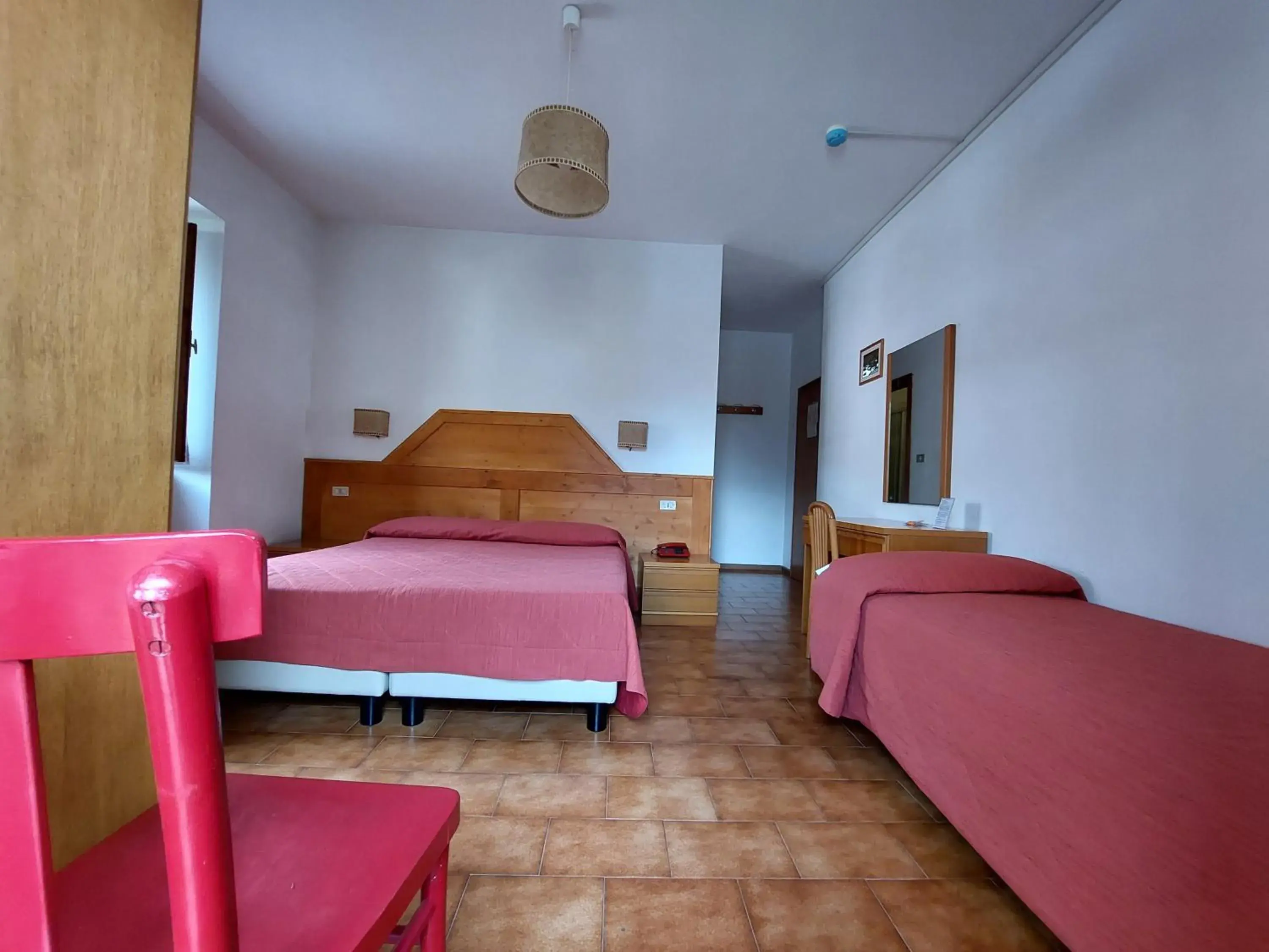 Triple Room with Private Bathroom in Hotel Paganella Triple Room with Private Bathroom in Hotel Paganella