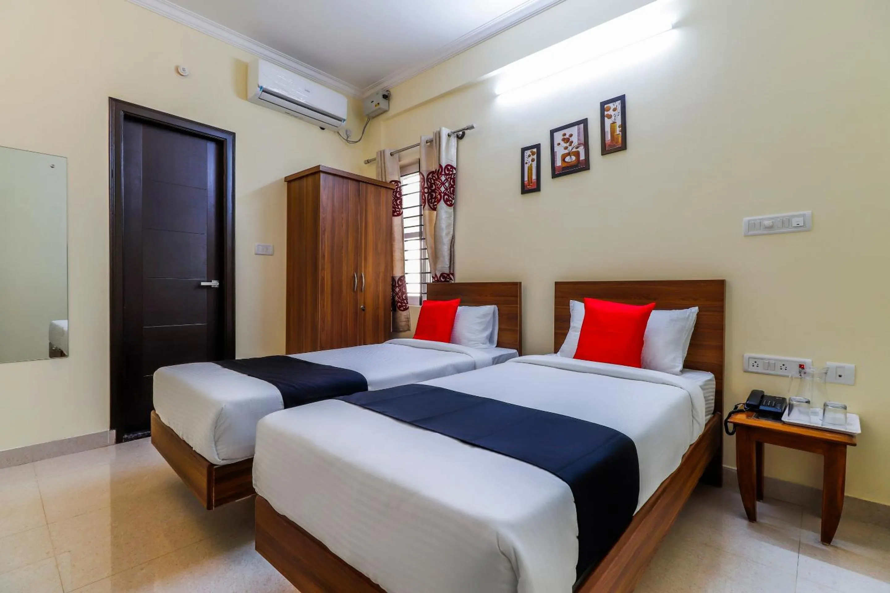 Bedroom, Bed in Capital O SLN Residency