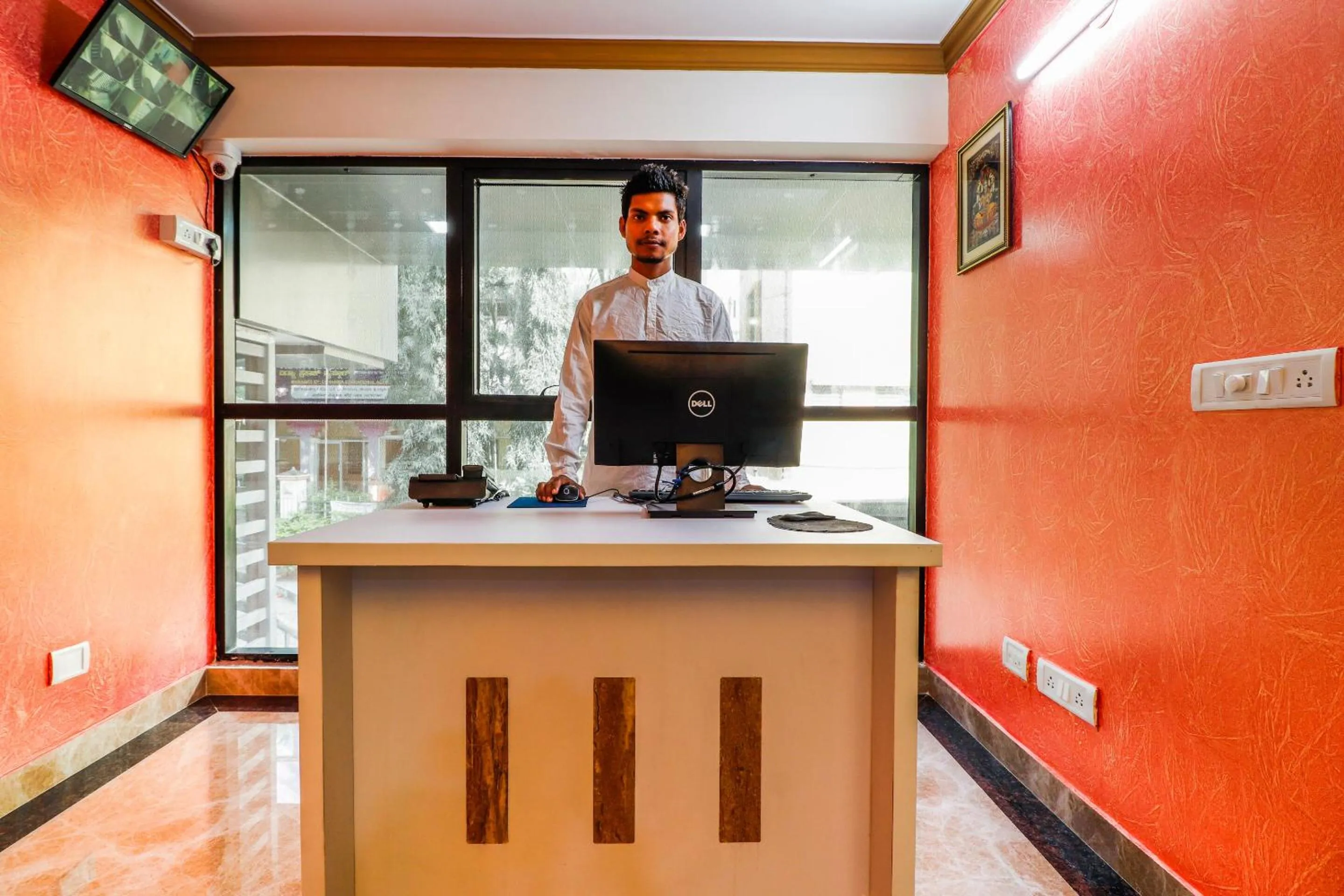 Lobby or reception in Capital O SLN Residency