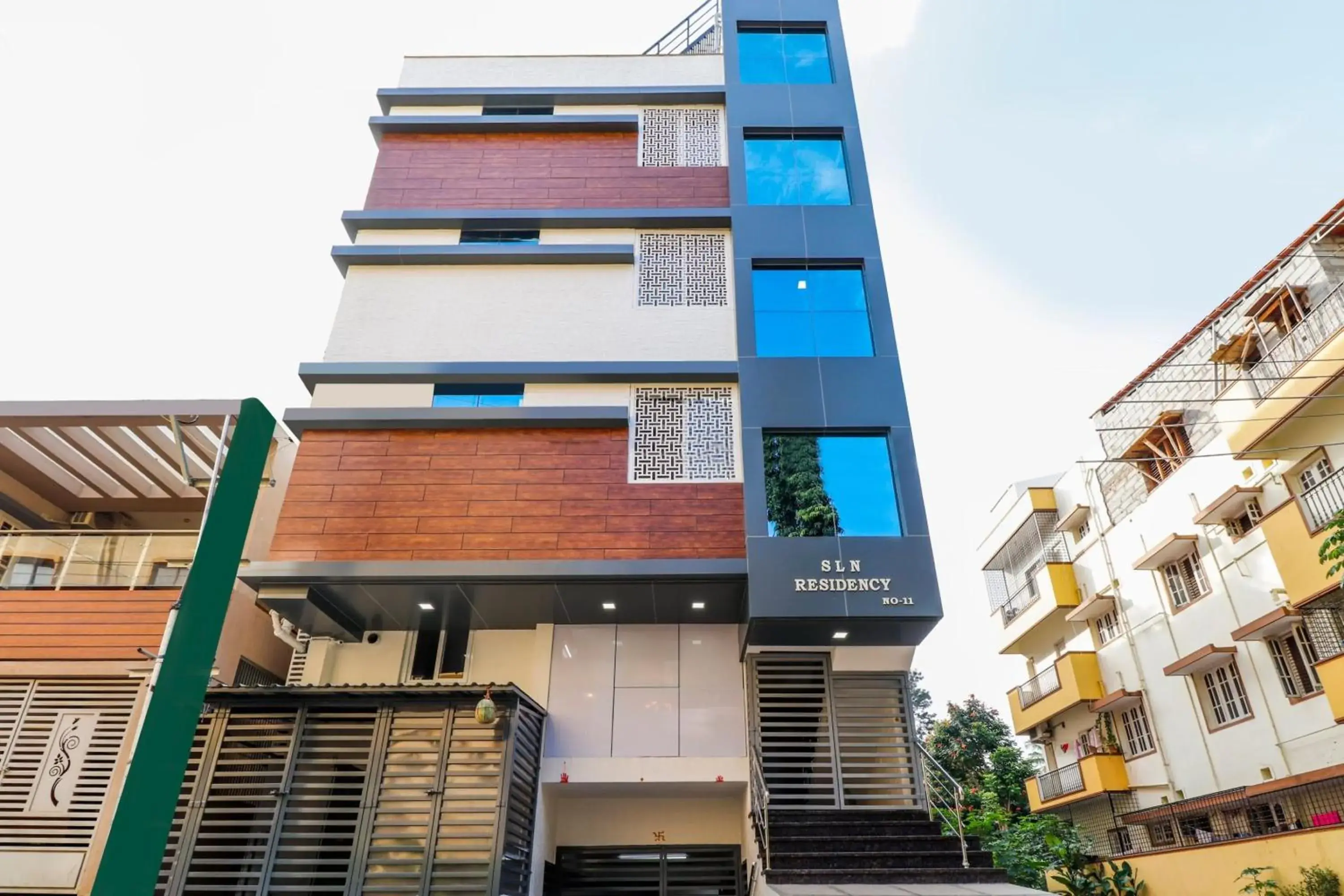 Facade/entrance in Capital O SLN Residency Facade/entrance in Capital O SLN Residency