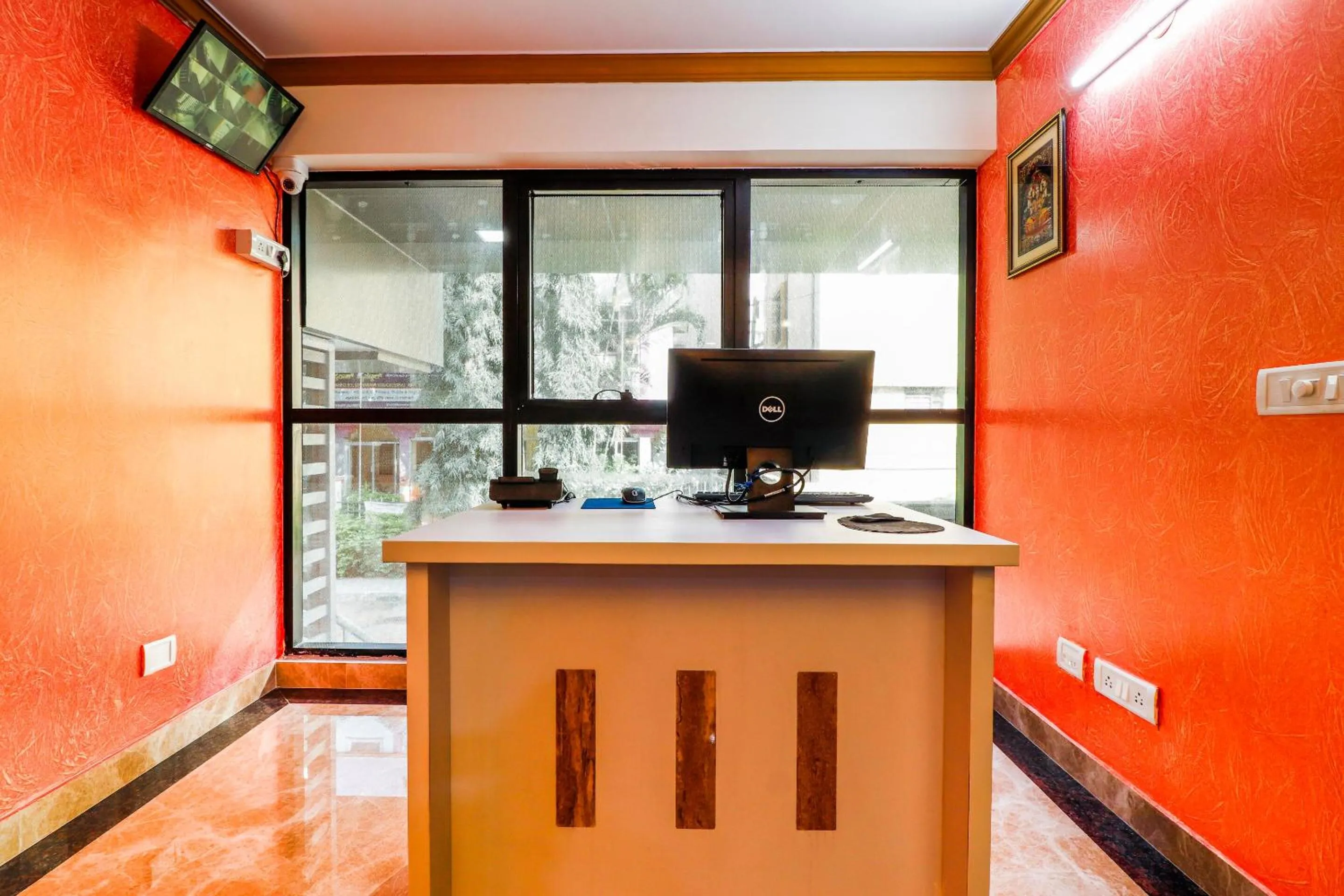 Lobby or reception in Capital O SLN Residency