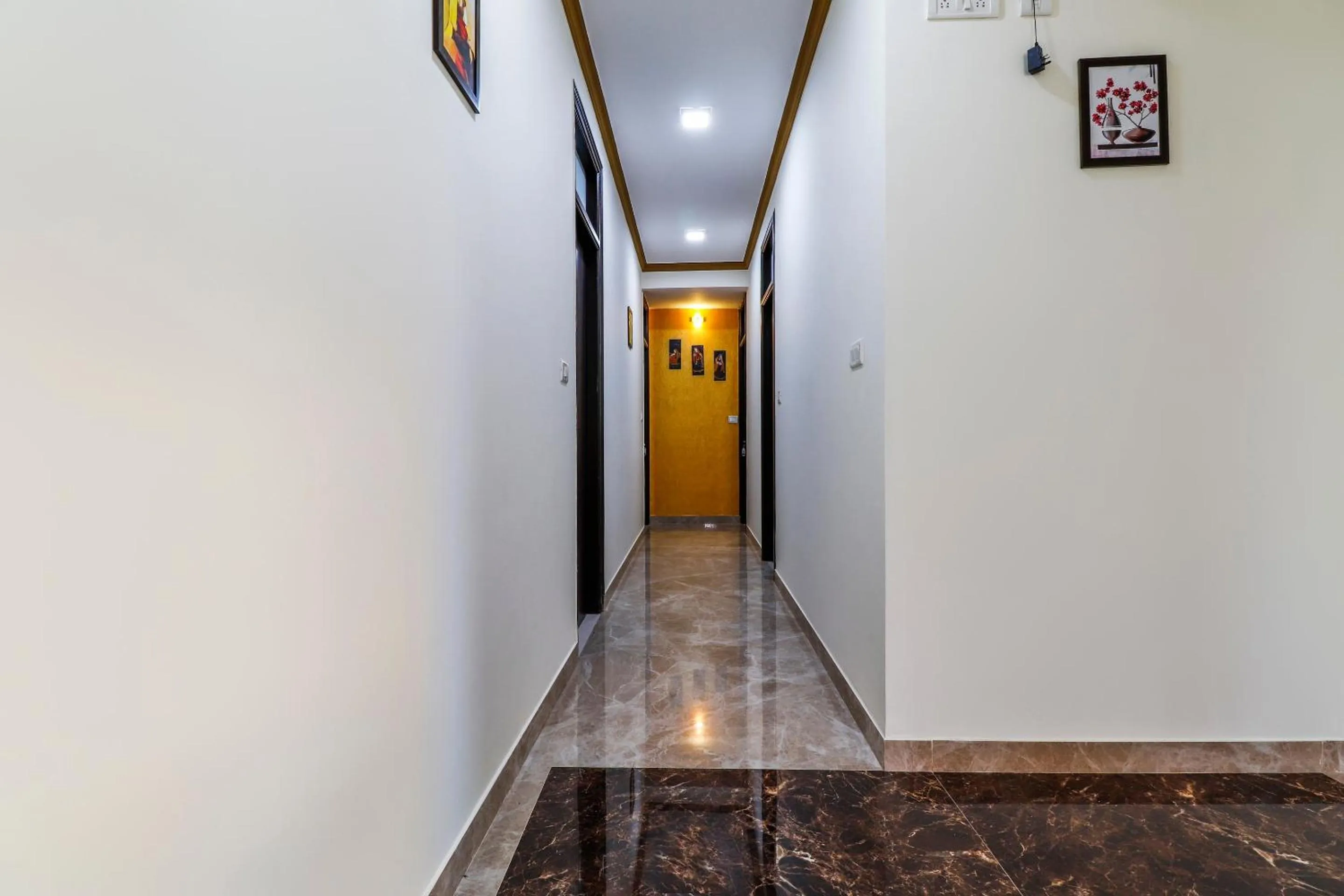 Lobby or reception in Capital O SLN Residency