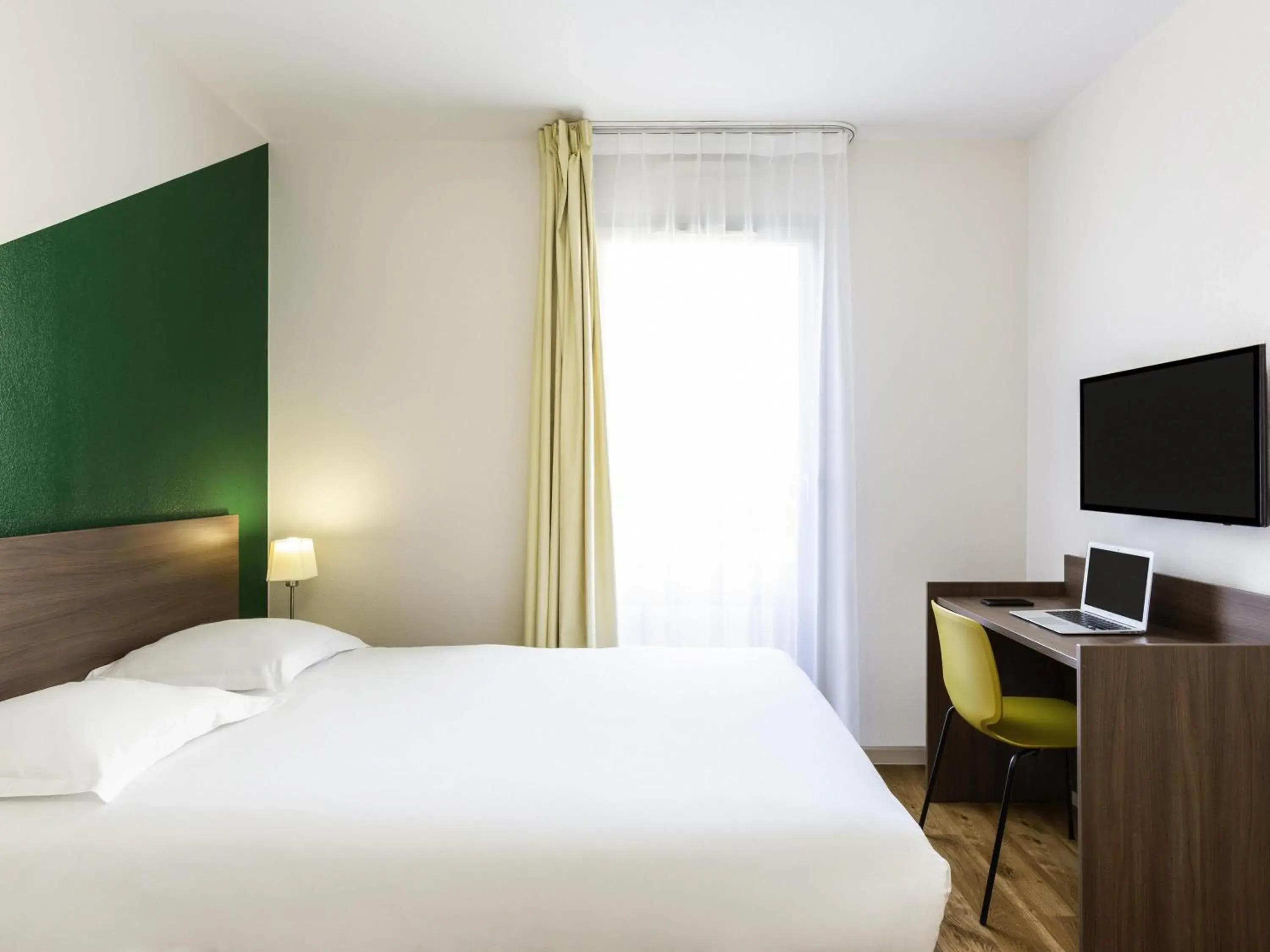 Bedroom, Bed in Aparthotel Adagio Access Carrières Sous Poissy Bedroom, Bed in Aparthotel Adagio Access Carrières Sous Poissy