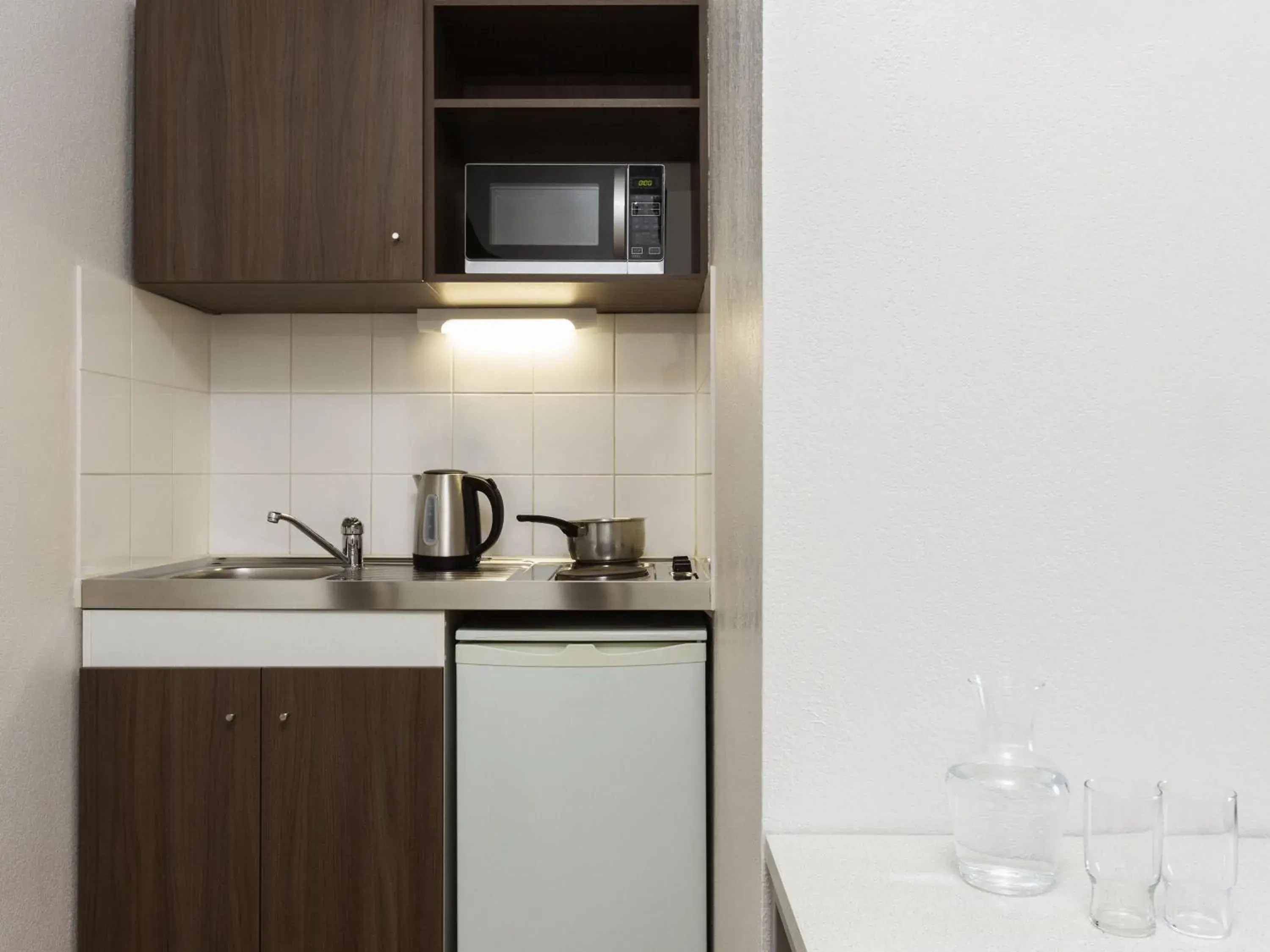 Bedroom in Aparthotel Adagio Access Carrières Sous Poissy Bedroom in Aparthotel Adagio Access Carrières Sous Poissy