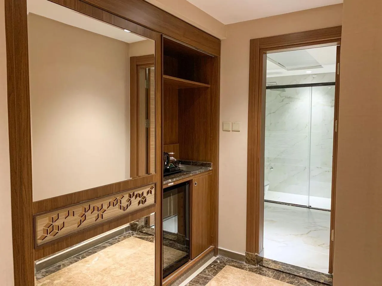 Bedroom in Midan Hotel & Suites Al Aziziya