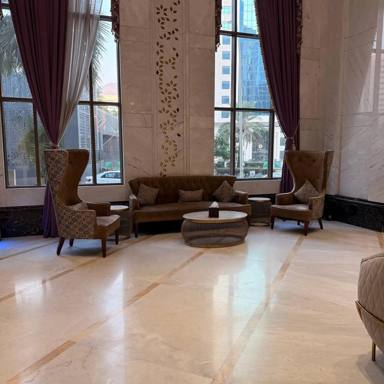 Lobby or reception in Midan Hotel & Suites Al Aziziya