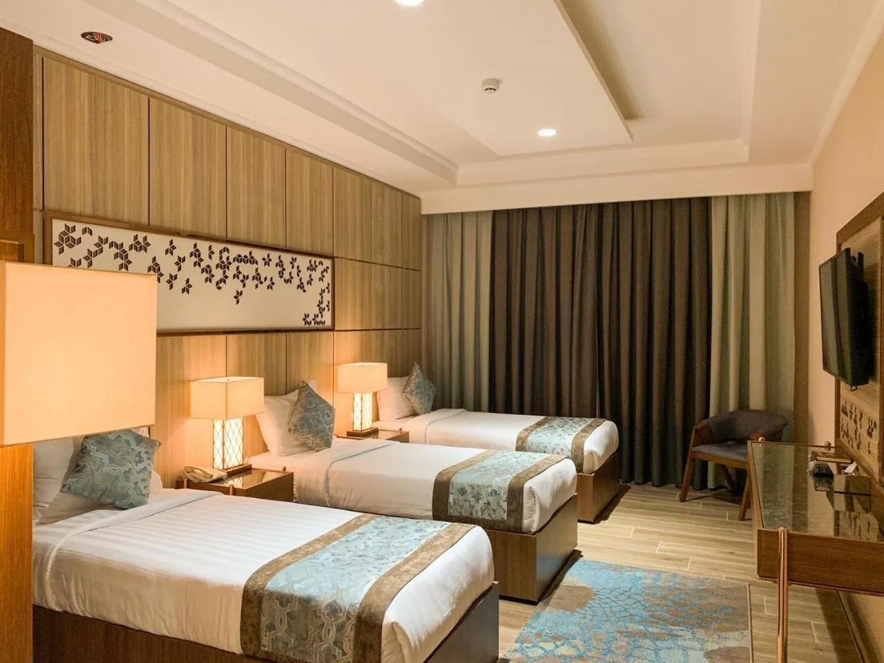 Bedroom, Bed in Midan Hotel & Suites Al Aziziya
