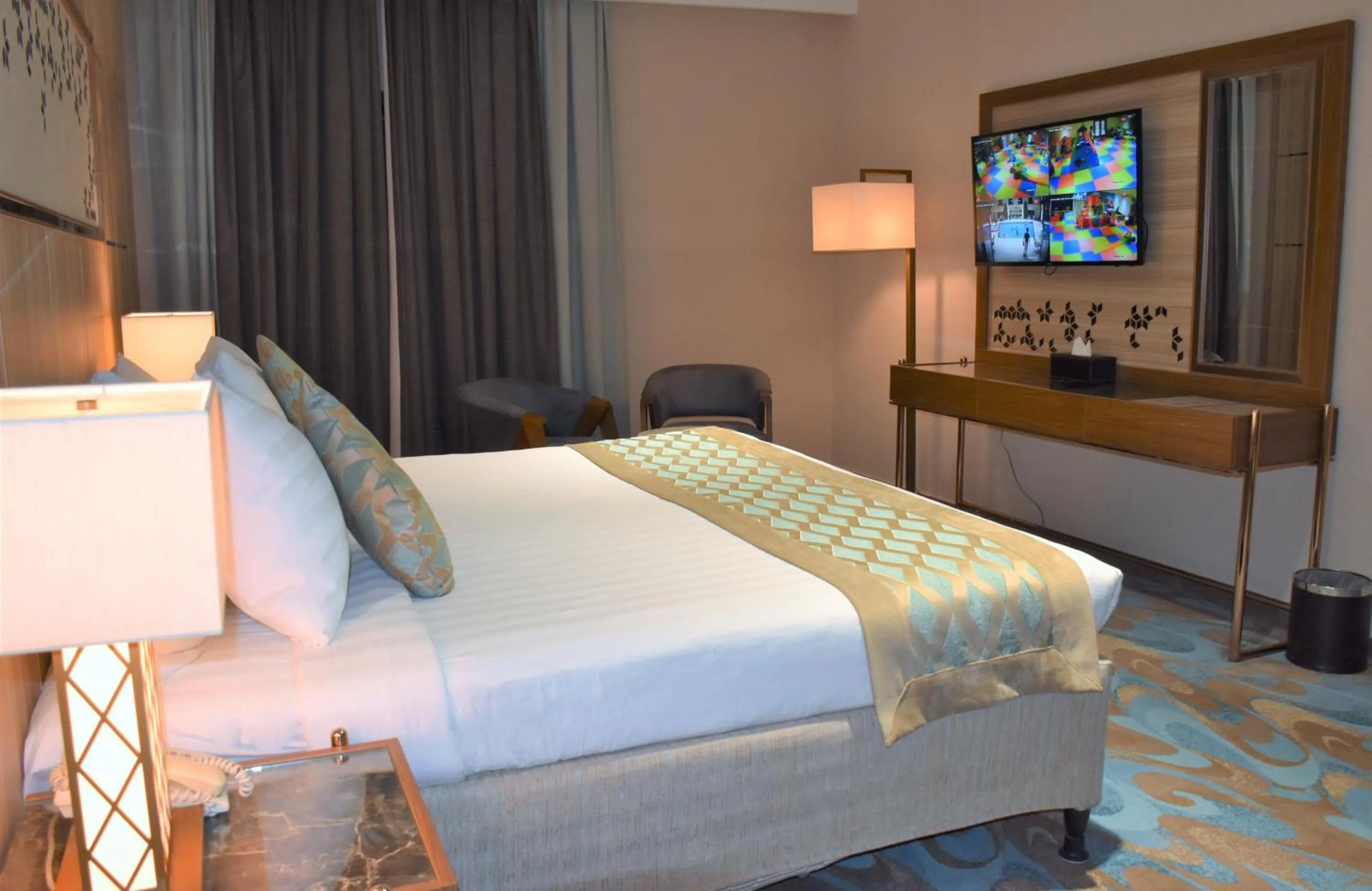Bedroom, Bed in Midan Hotel & Suites Al Aziziya