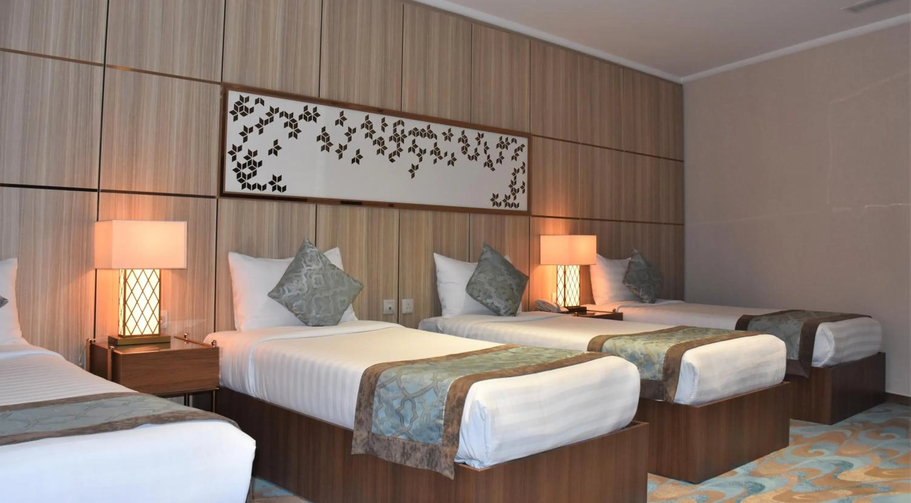 Bed in Midan Hotel & Suites Al Aziziya