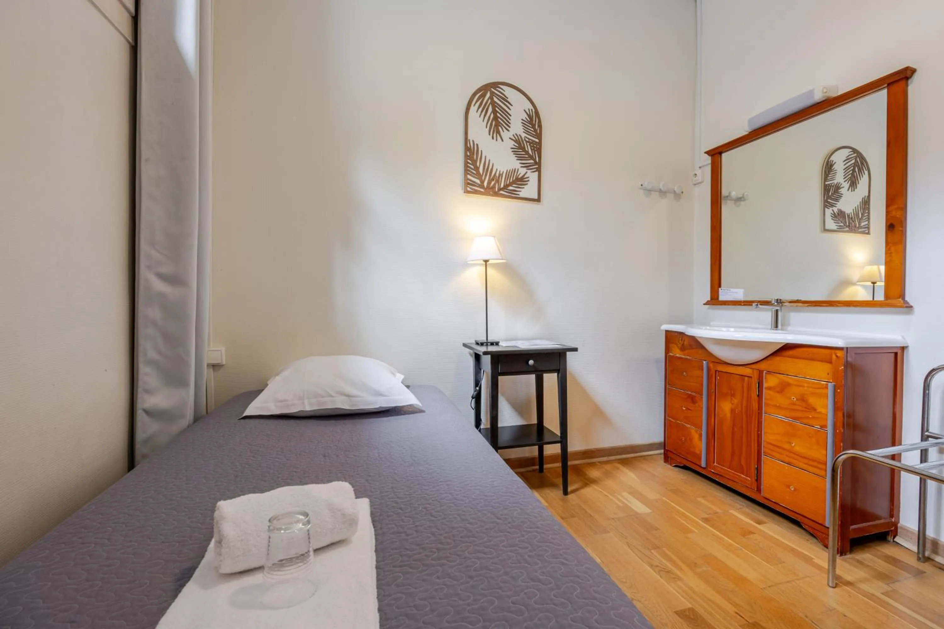 Bed in Hôtel Patricia - Strasbourg Hyper Centre