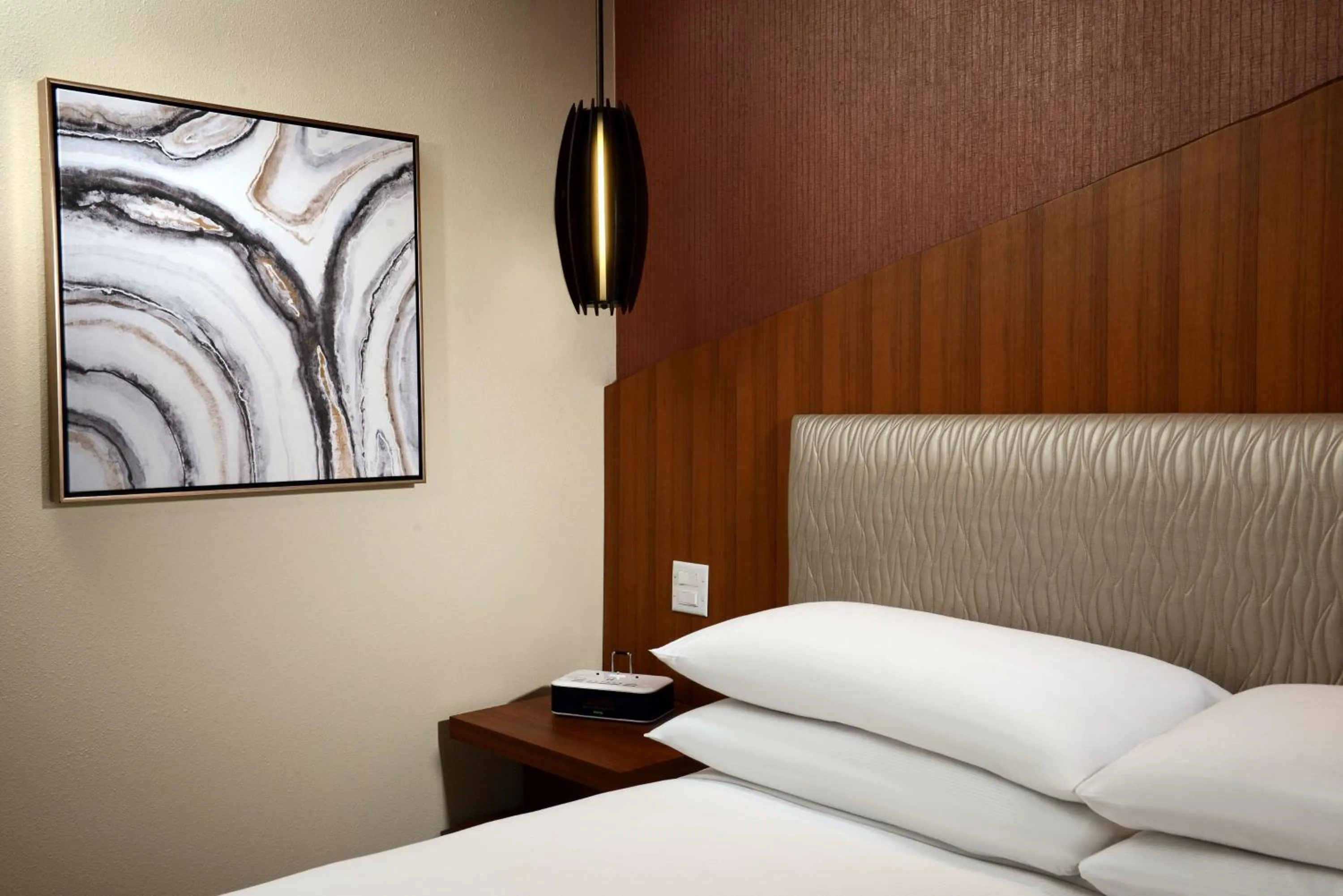 Bed in The Inverness Denver, a Hilton Golf & Spa Resort