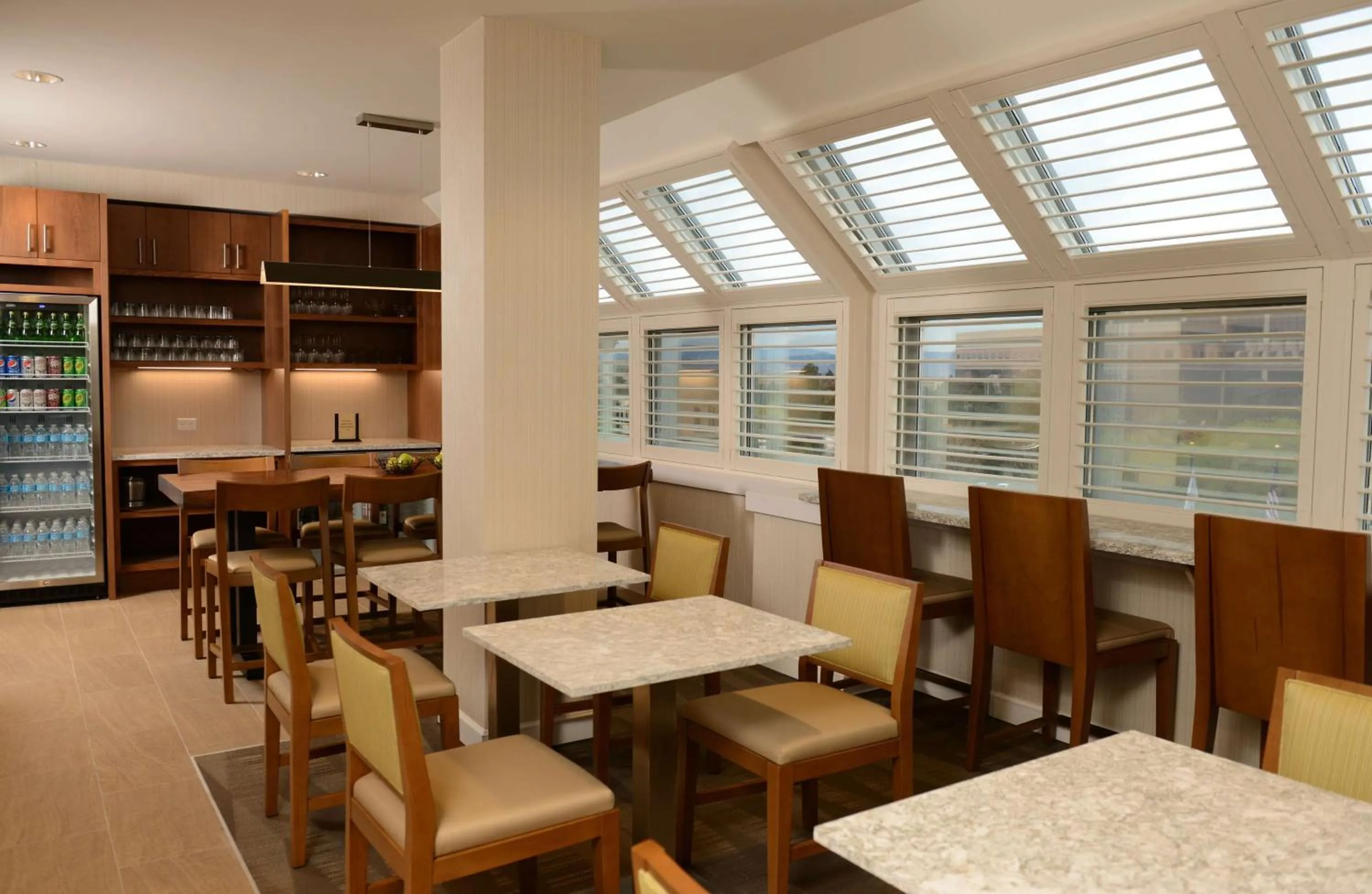 Bed in The Inverness Denver, a Hilton Golf & Spa Resort