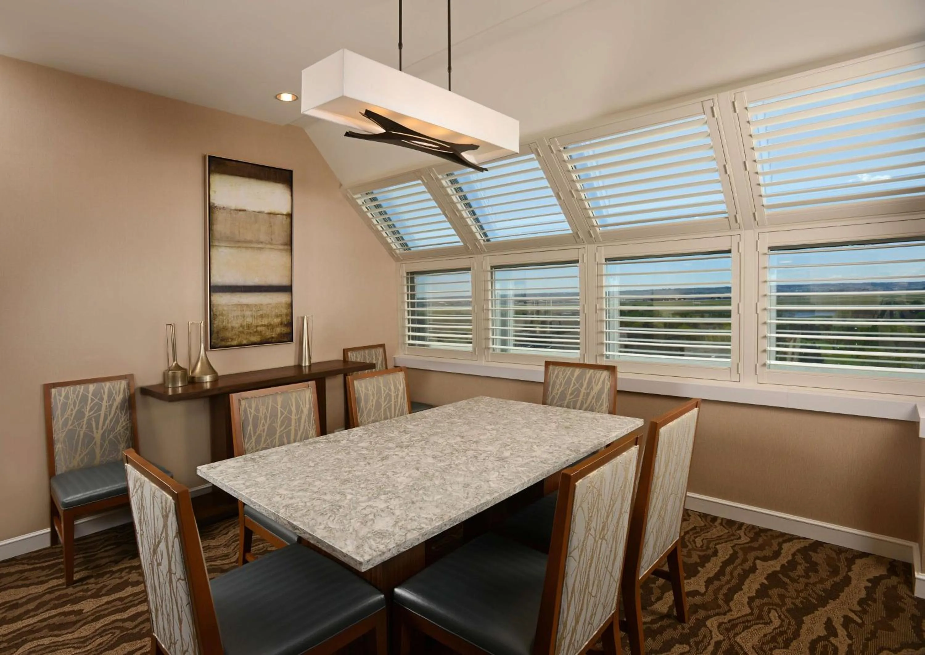 Living room in The Inverness Denver, a Hilton Golf & Spa Resort