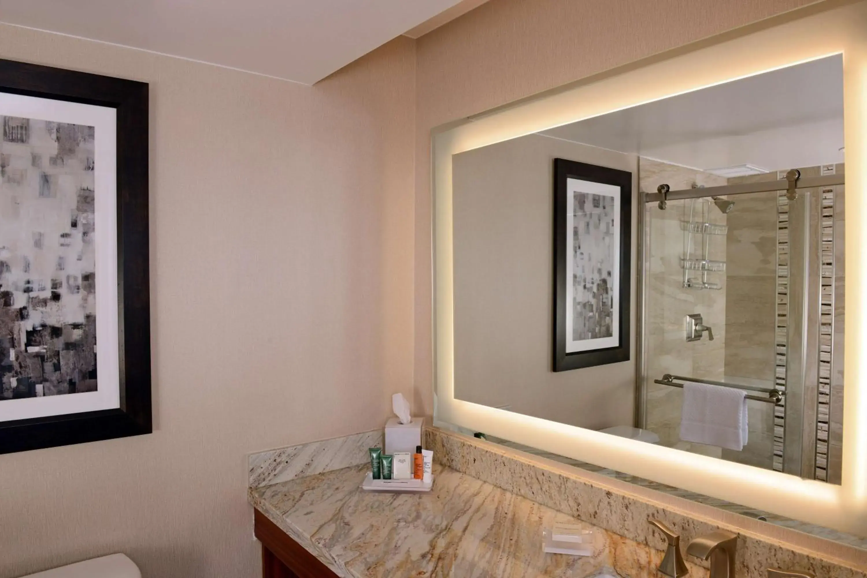 Bathroom in The Inverness Denver, a Hilton Golf & Spa Resort Bathroom in The Inverness Denver, a Hilton Golf & Spa Resort