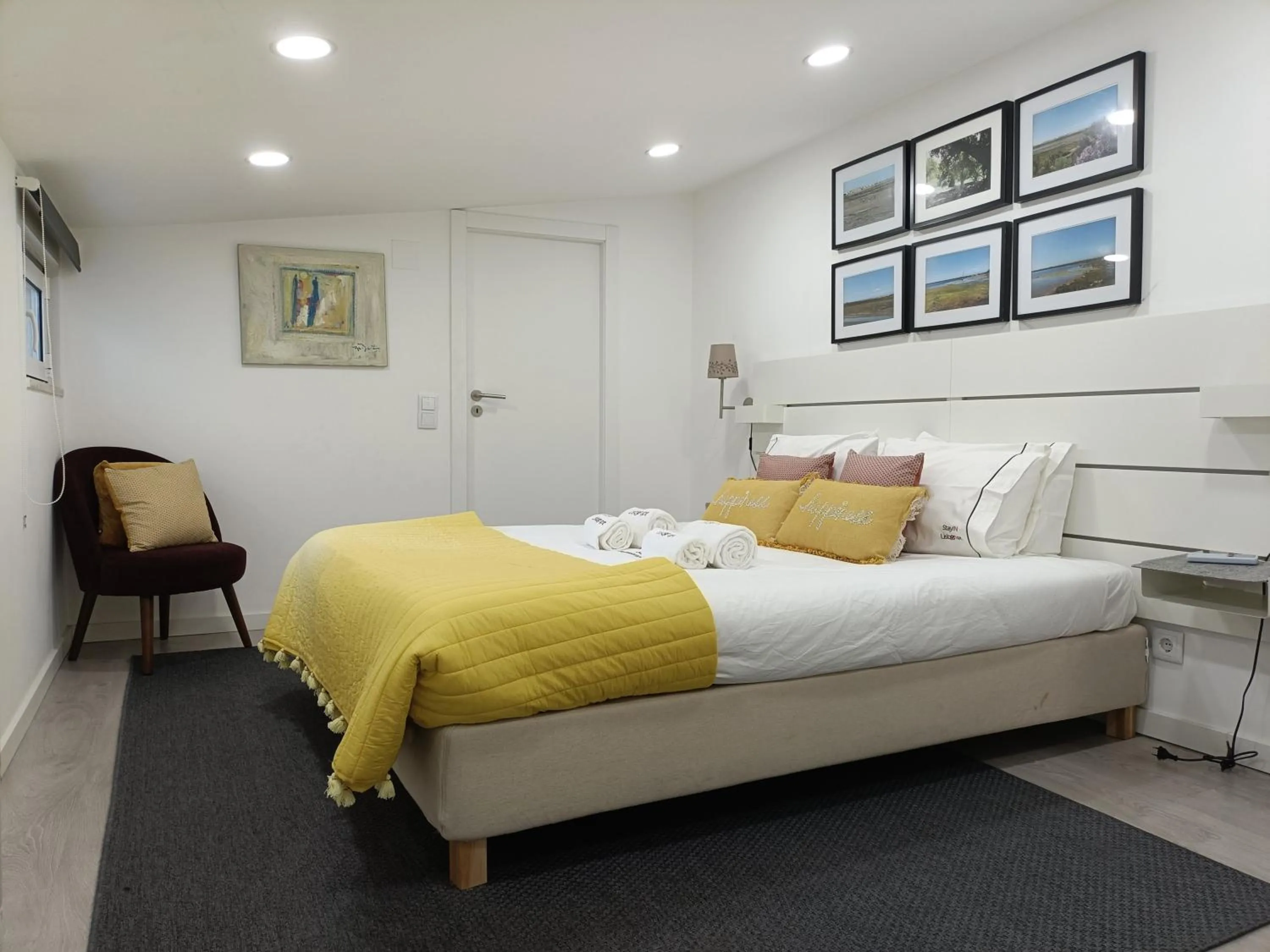 Bed in DoBairro Suites at Merces